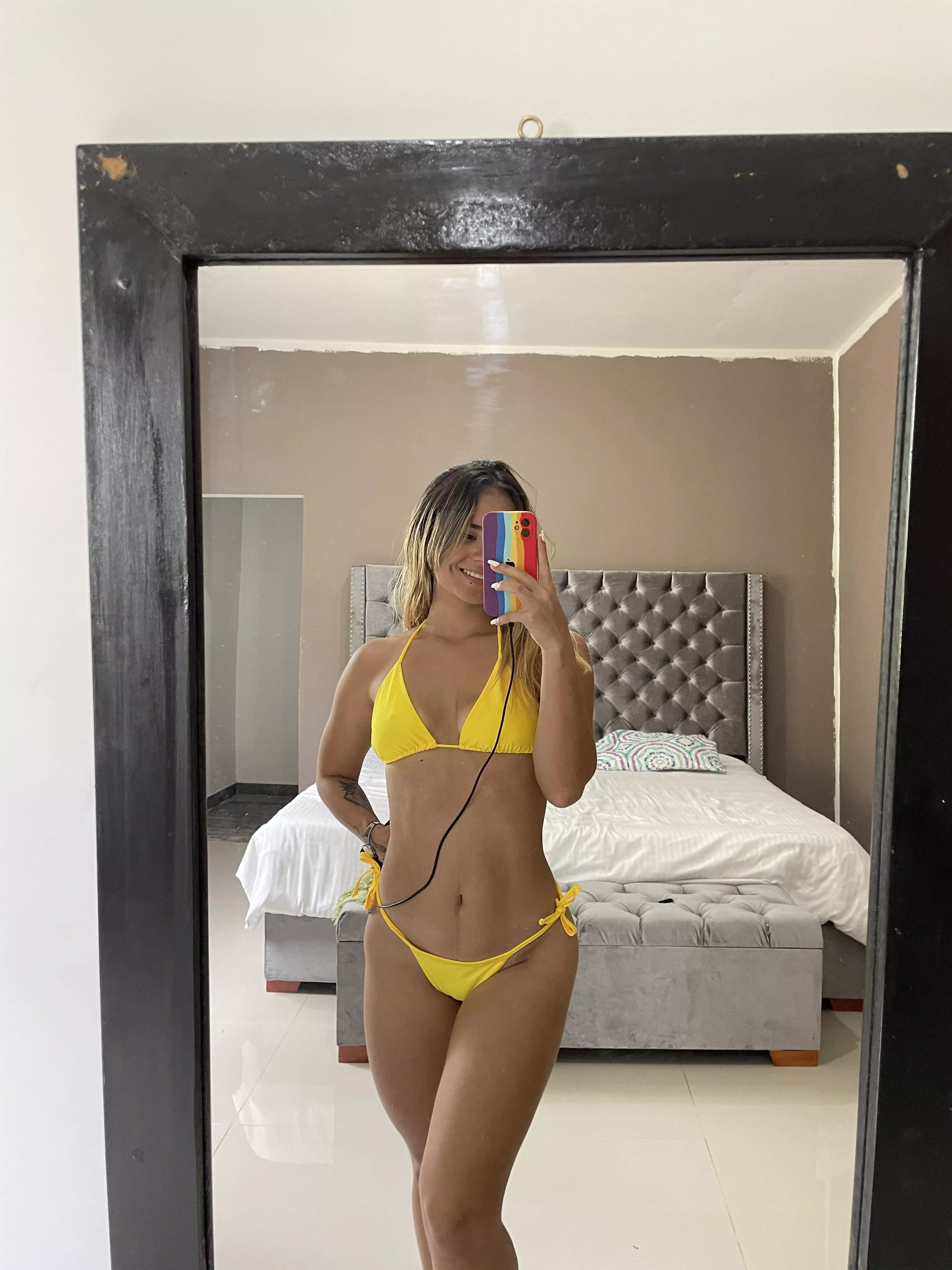 Yellow bikini looking like your banana a mean a banana..