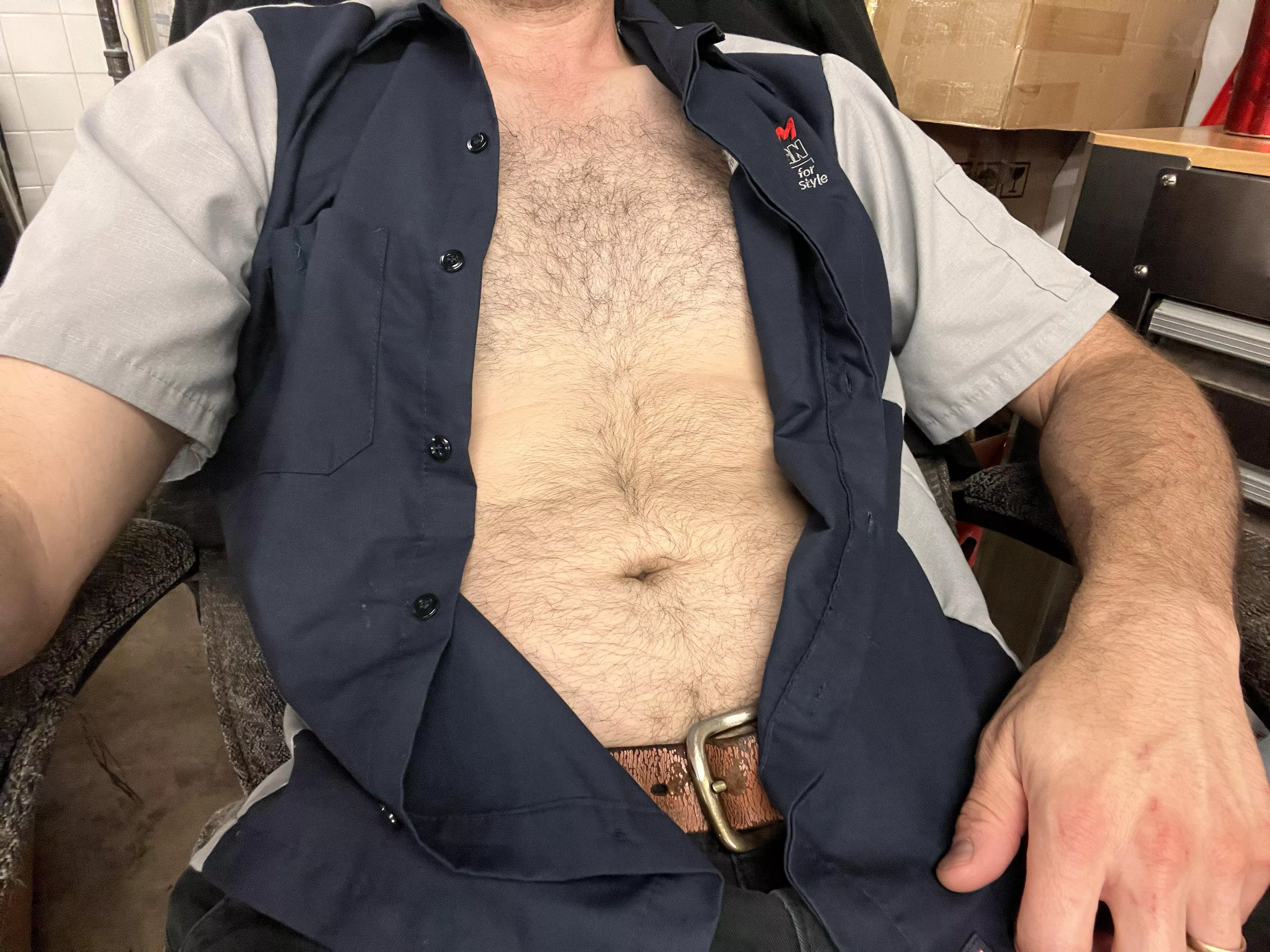 Chest hair peeking out at work