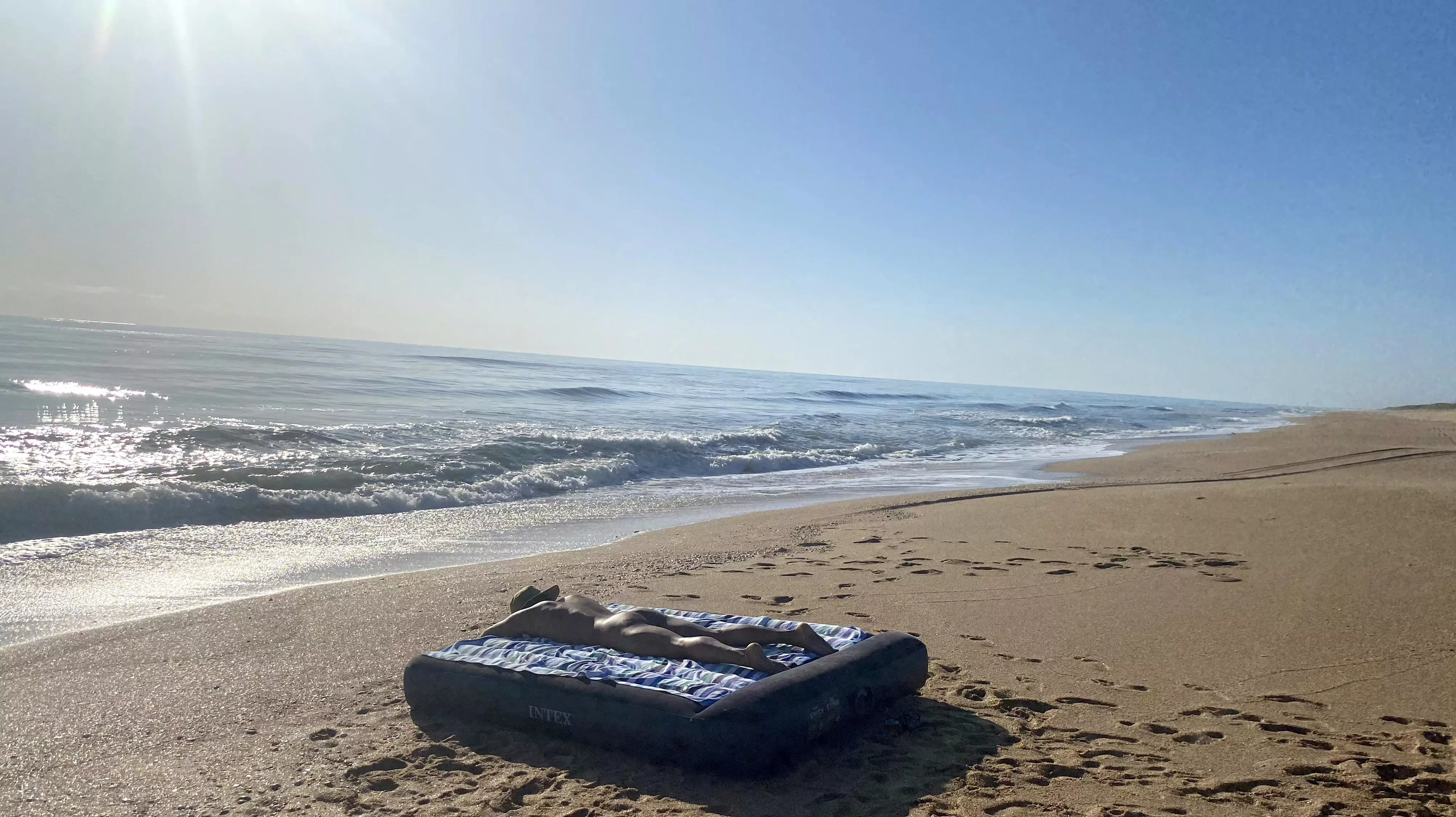 Enjoying sunbathing at the beach