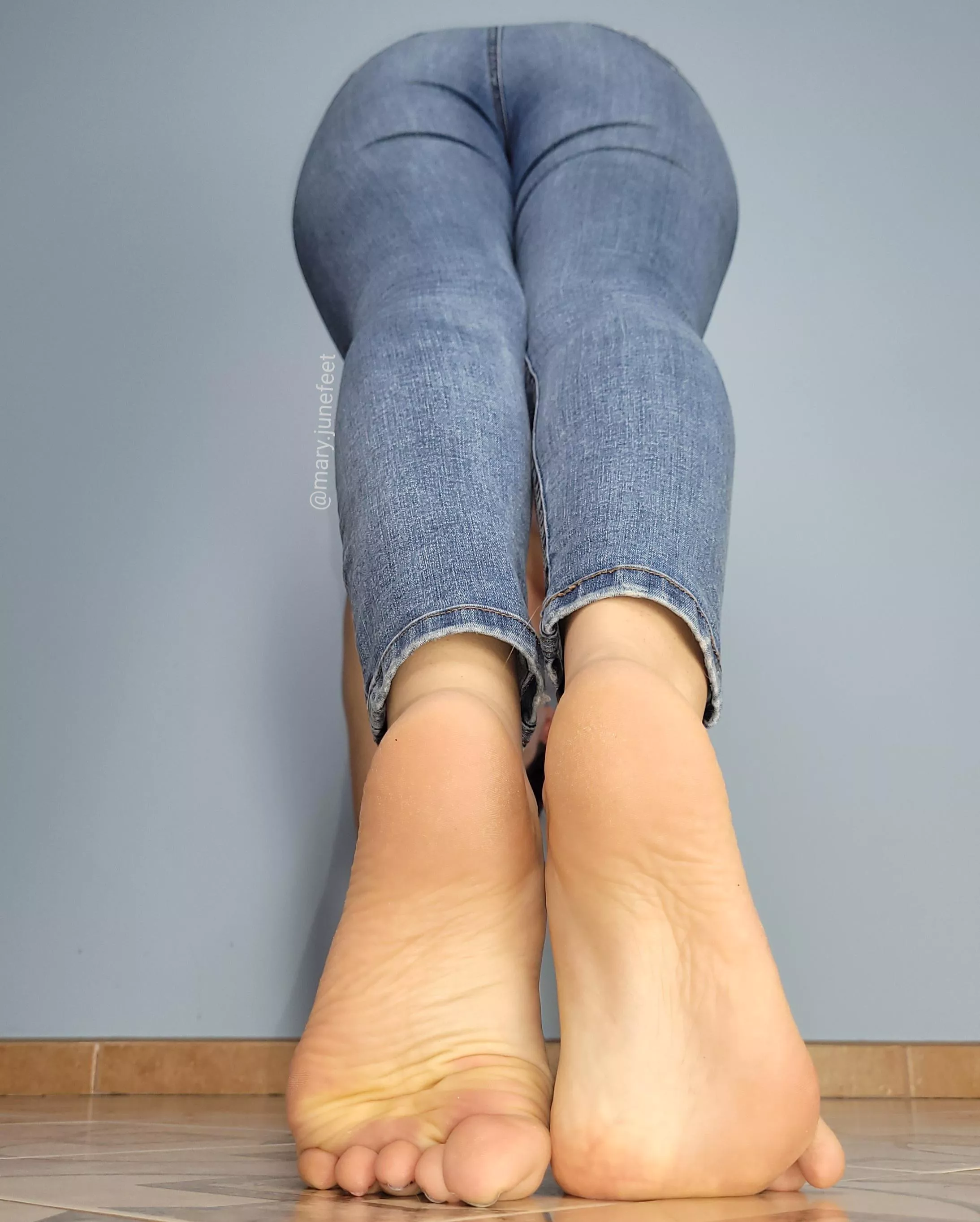 Orange soles and jeans.