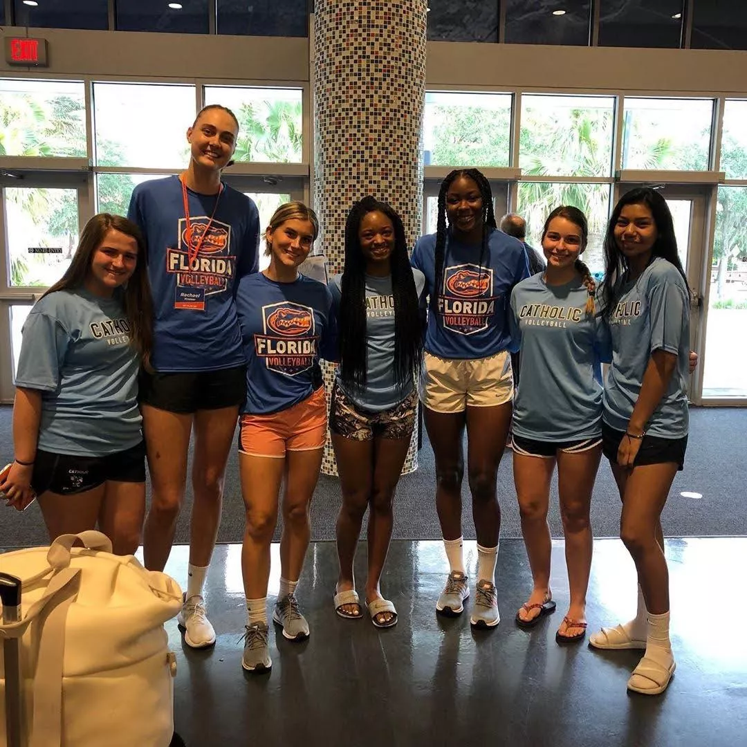 Rachael Kramer head and shoulders above volleyball teammates