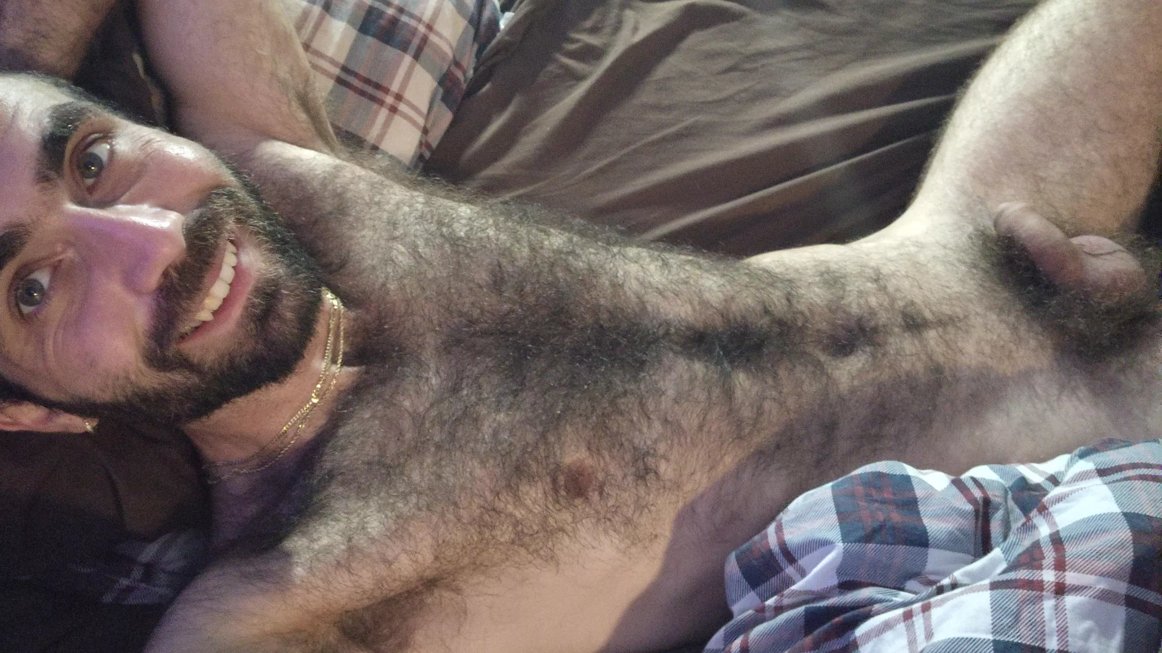 Wyd? Just layign in bed. Showing off my hairy body. Do you guys like how I look?