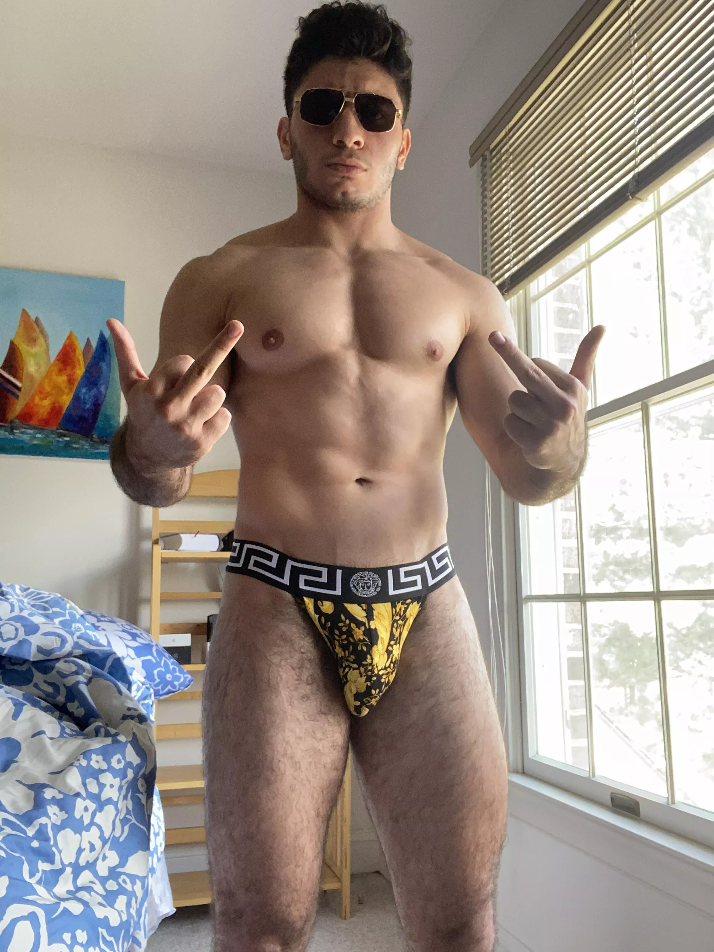 Cartier shades and Versace jockstrap. Only the best for Persian Master.