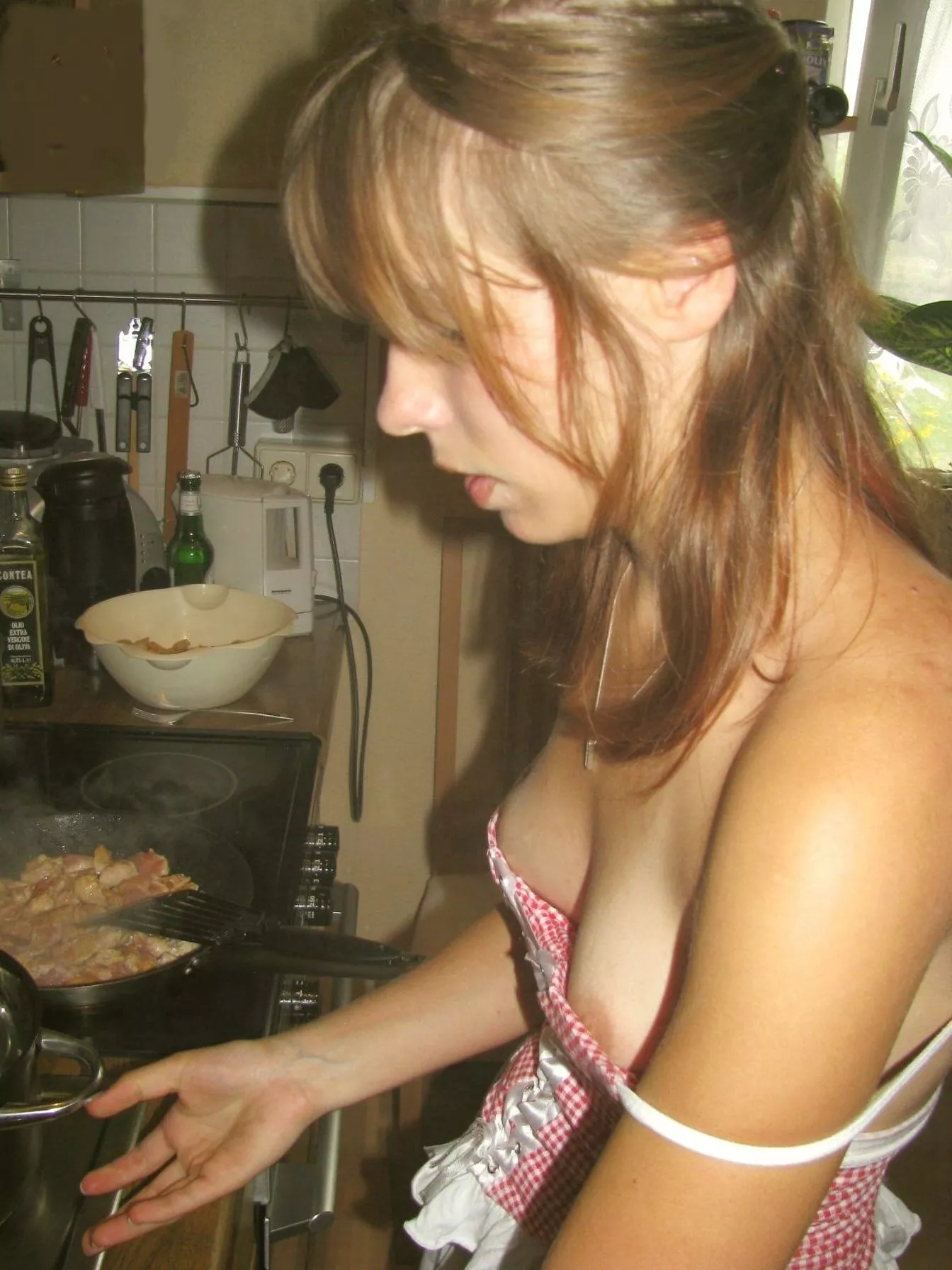 Cooking her dinner