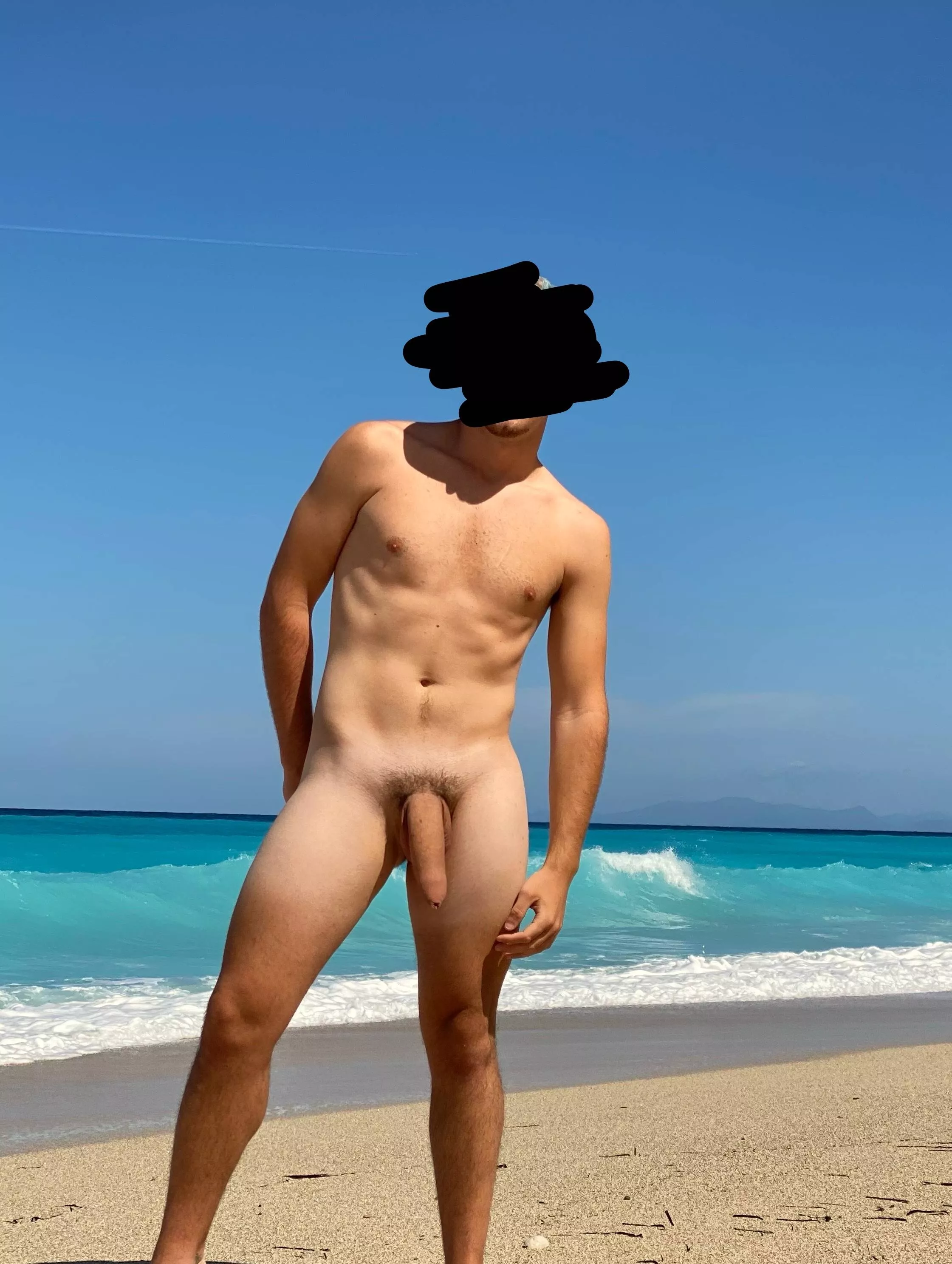 flexing my semi-hard dick on a nudist beach ðŸ˜œ