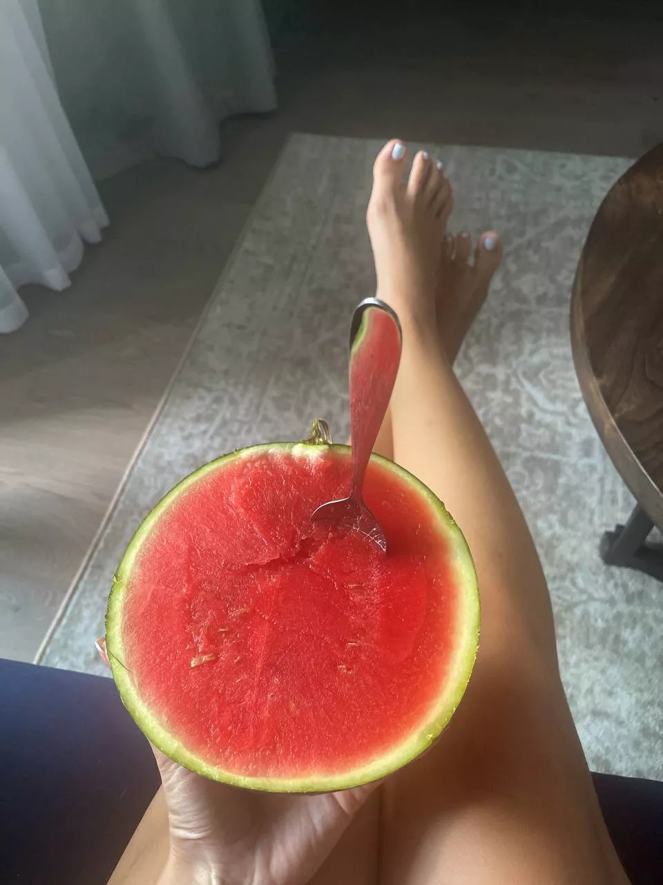 While I enjoy this watermelon, you enjoy my feet