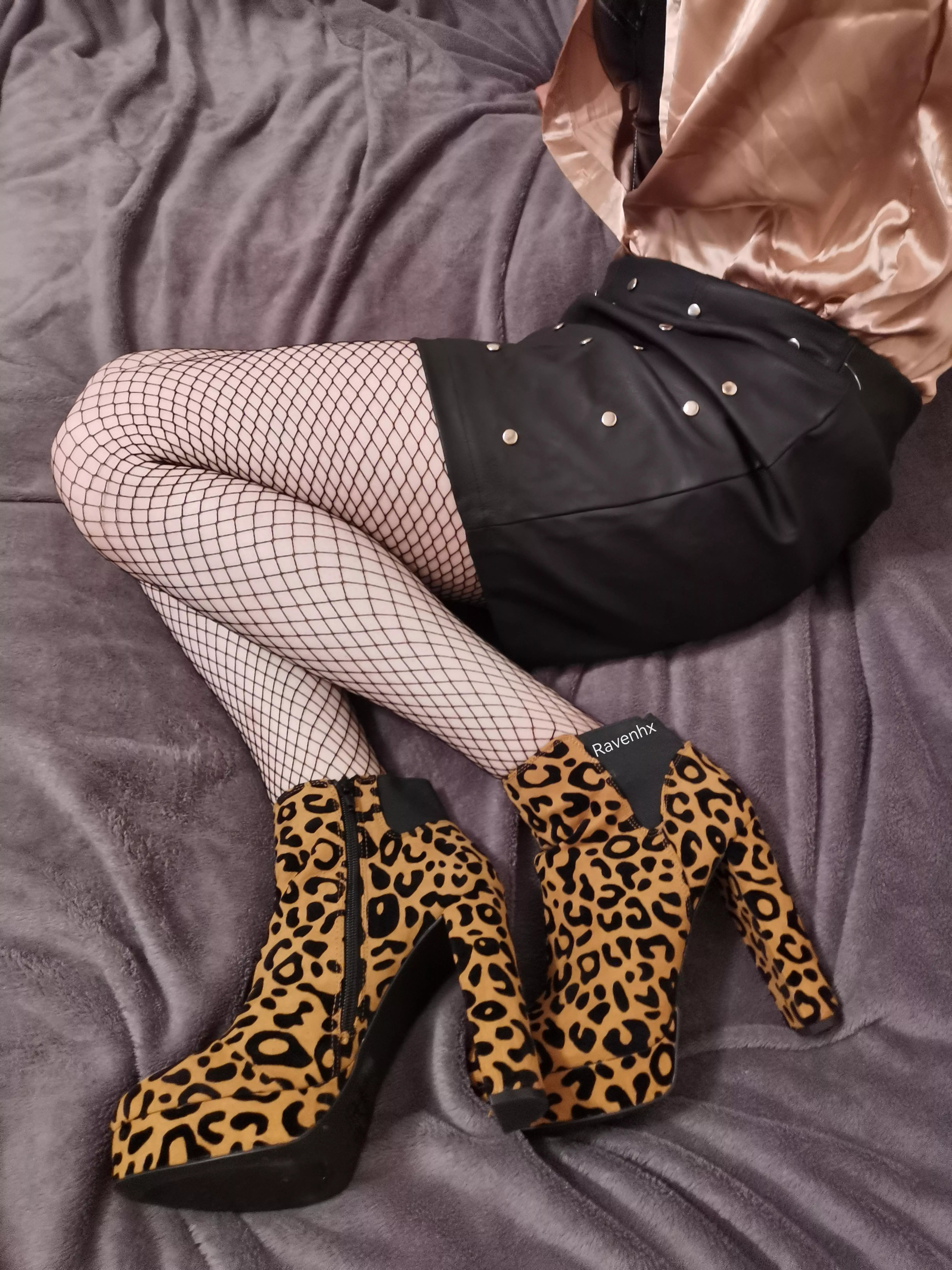 leopard print and fishnets work surprisingly well together