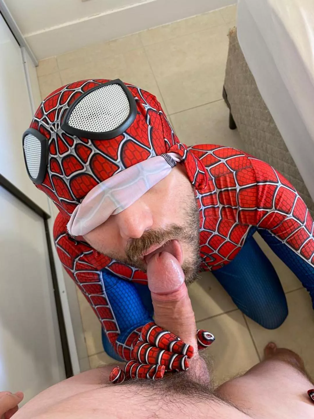 Sucking a cock for the first time while I'm wearing this spiderman suit. Who wants to be the next?