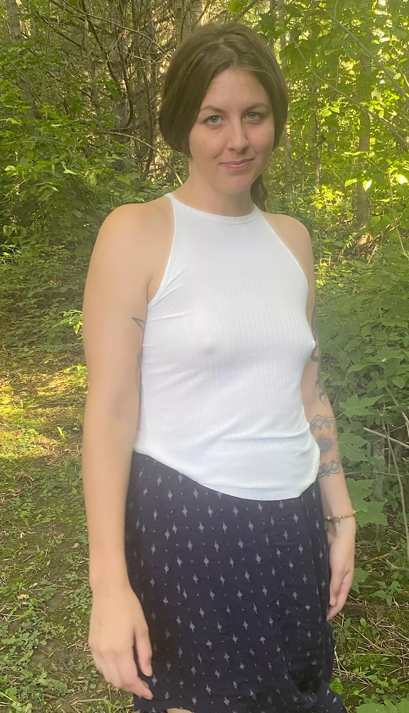 Sans bra in the forest.