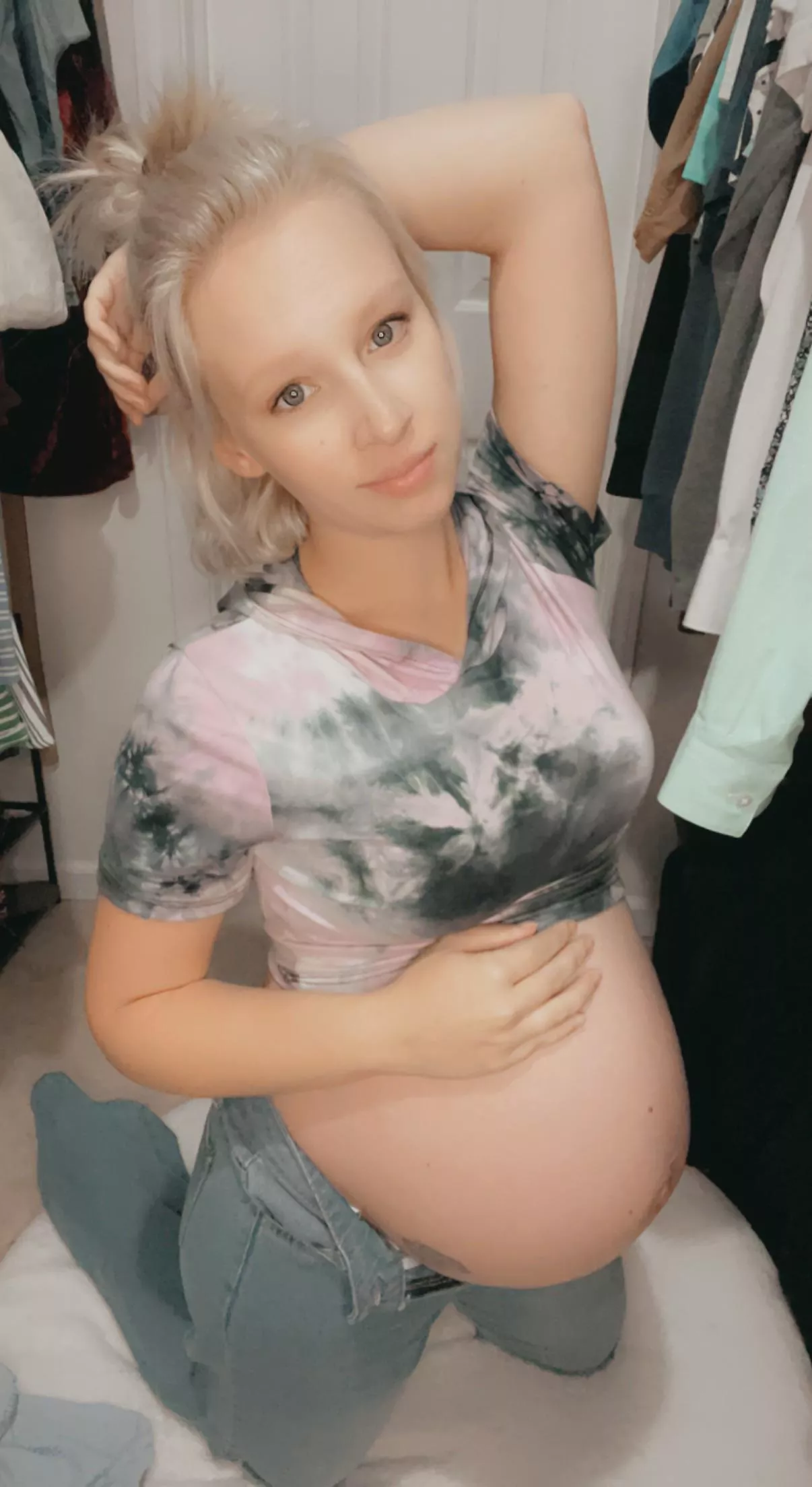 Trying on pre-pregnancy clothes at 36 weeks.