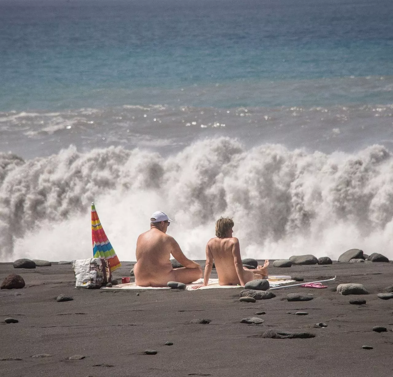 Very calm nudists in tsunami weather