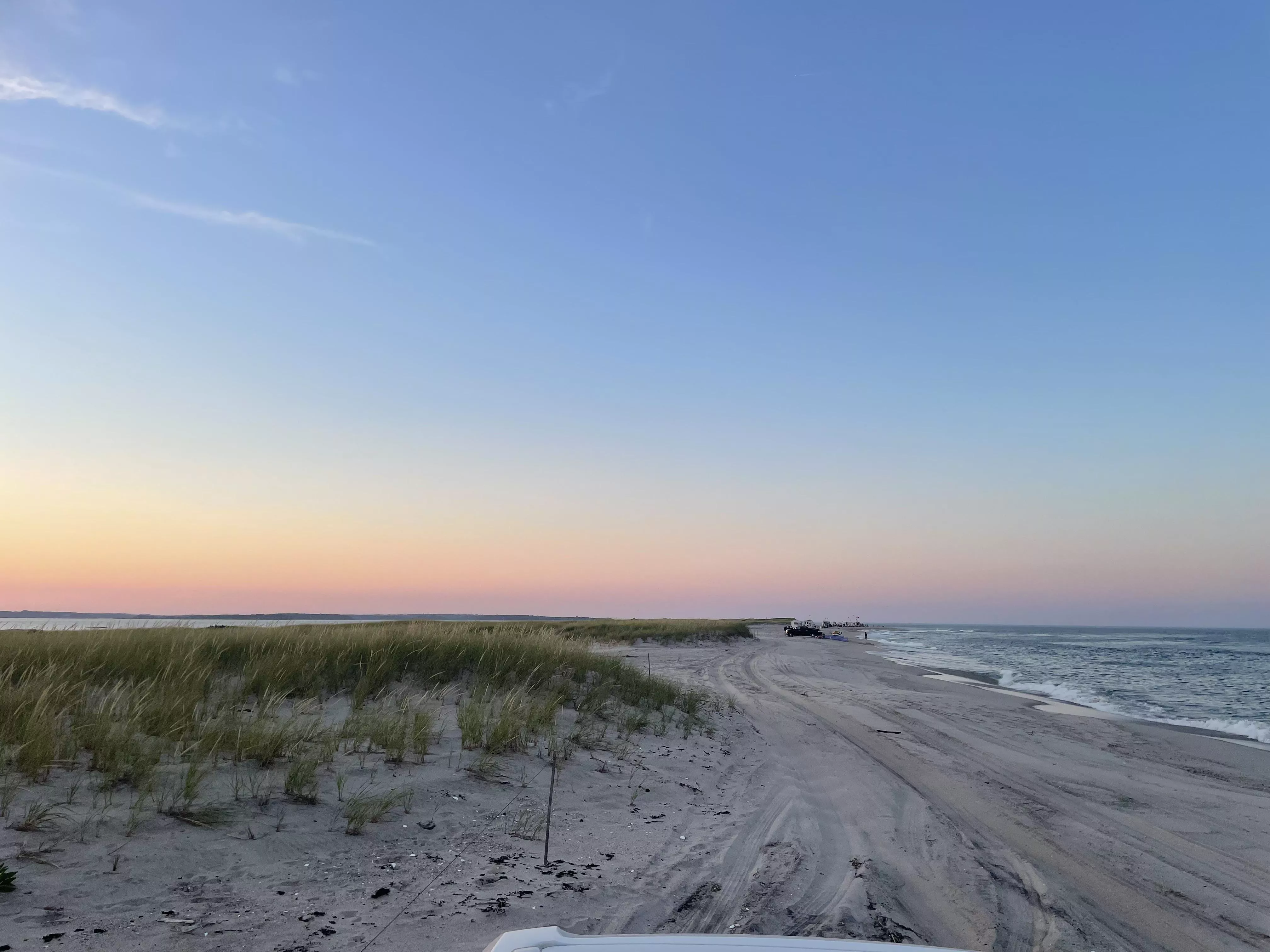 Happiness is where the sand meets the ocean