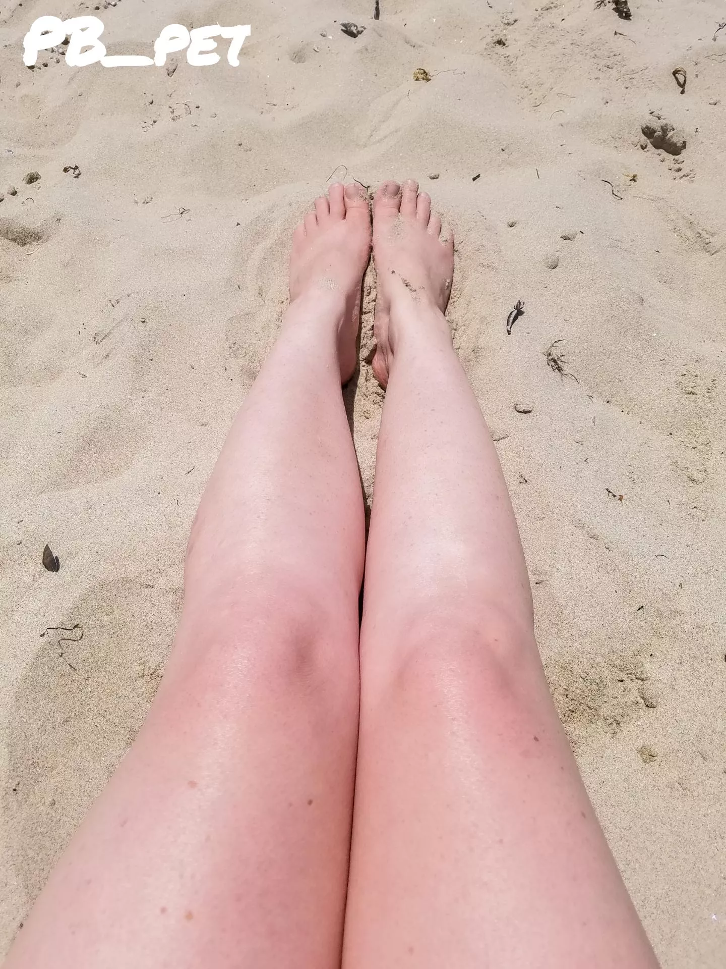 Toes in the sand.