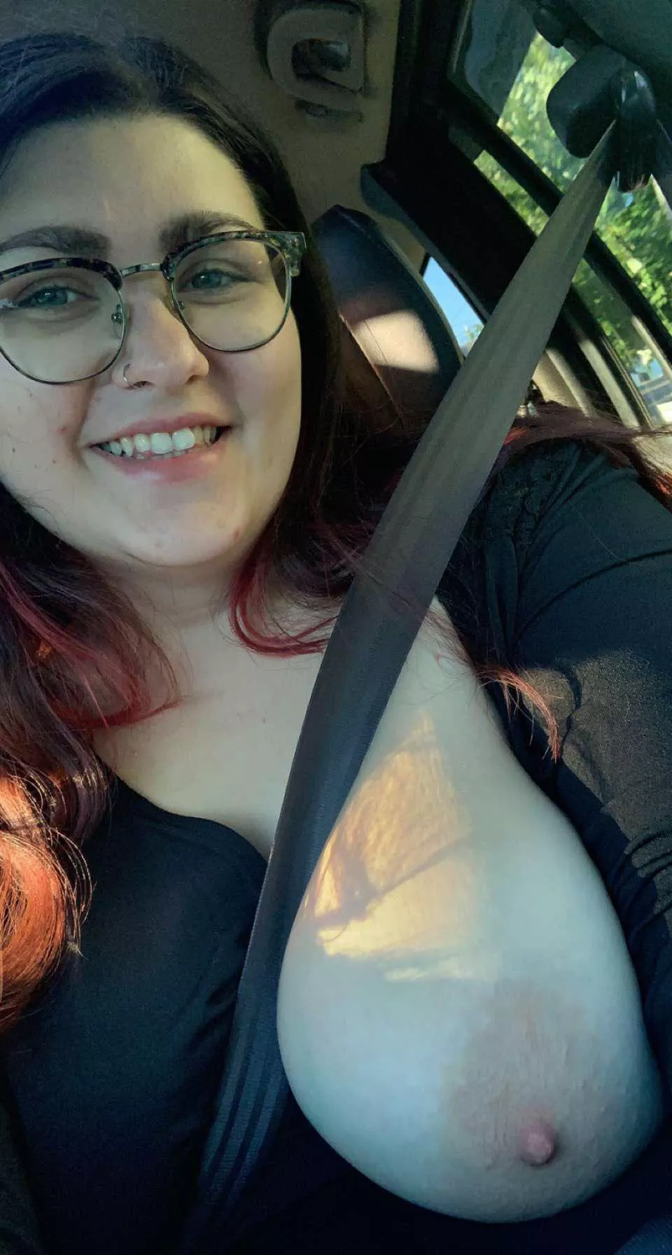 Driving with one boob out ðŸ˜˜