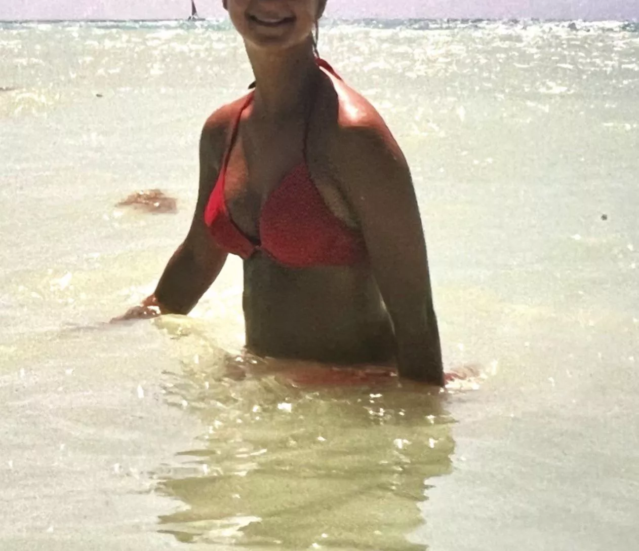 Enjoying the Sun In a pink bikini