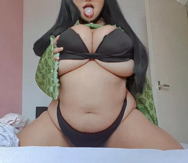 Huge tits spilling out + tongue out