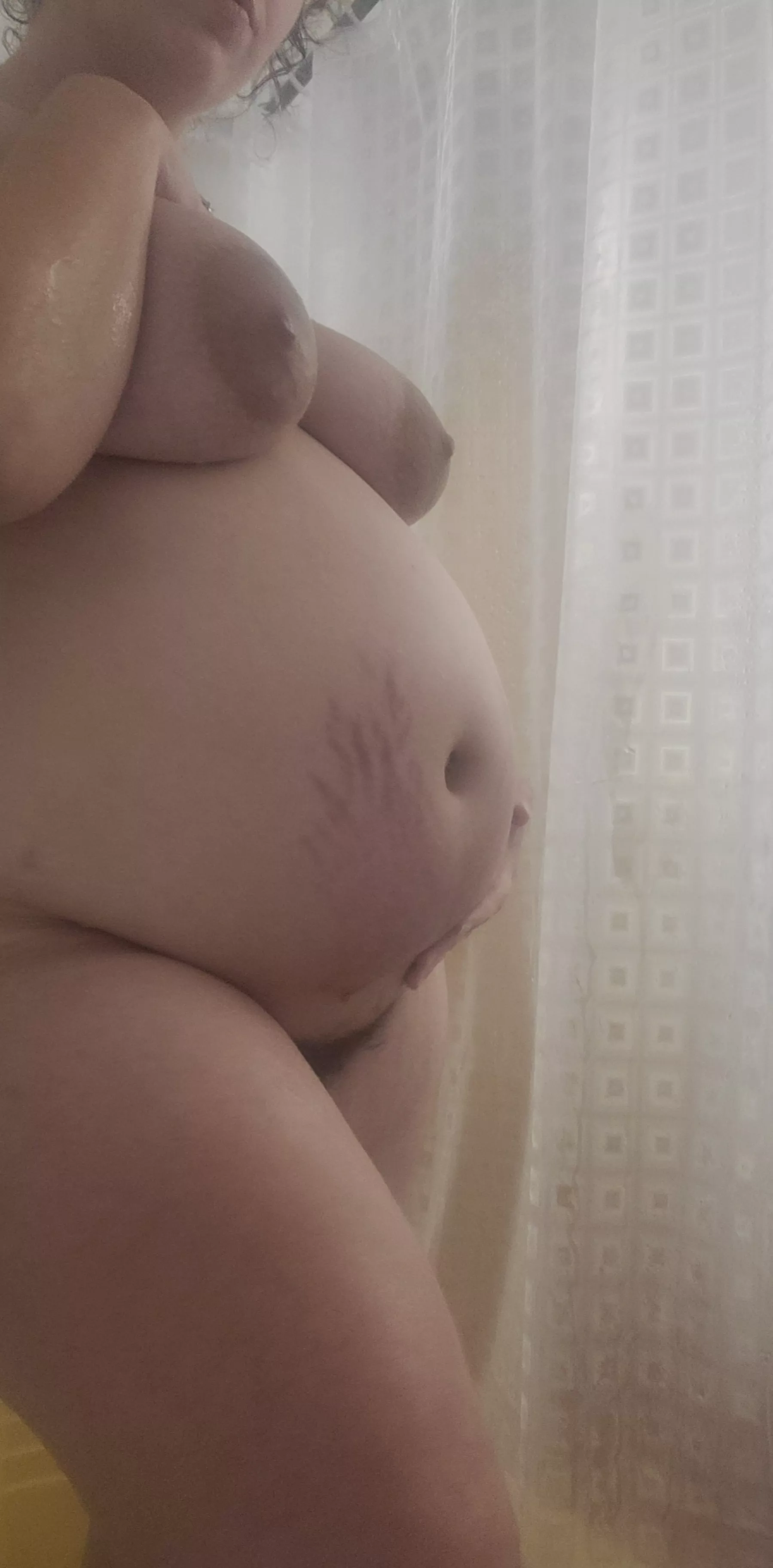 very pregnant and enjoying my shower. who wants to join.