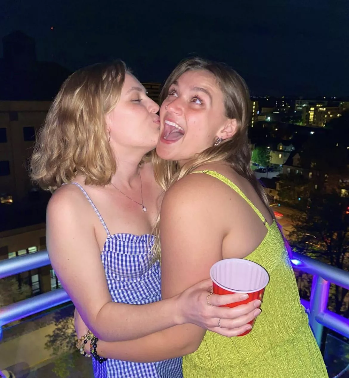 Annie and her roomate share a smooch