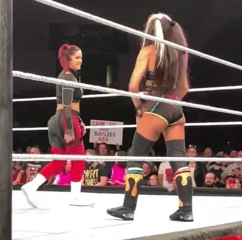 Bayley & Kai & that sign