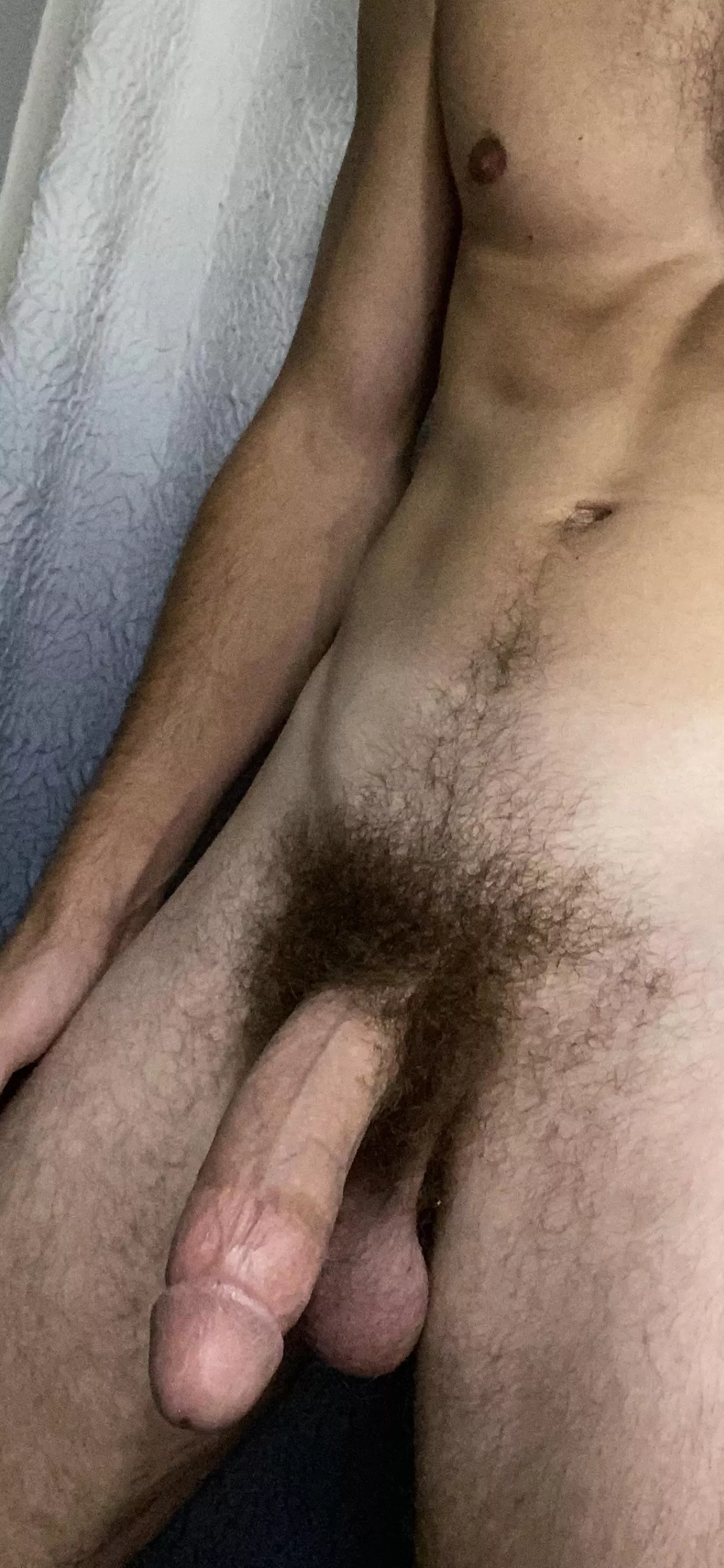 Skinny boy with a big hairy cock