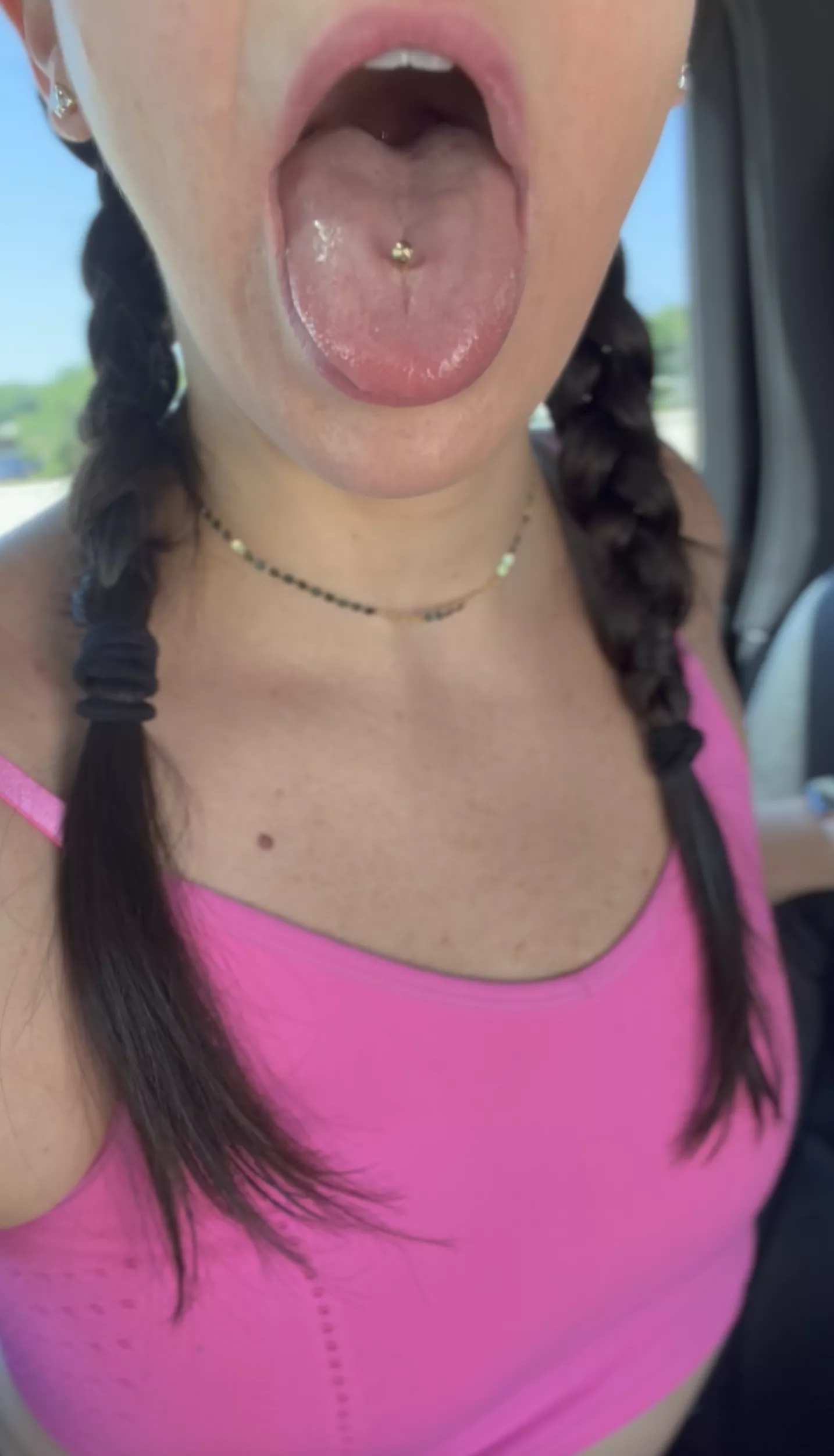 A mom with pigtails and a pierced tongue can only mean one thing