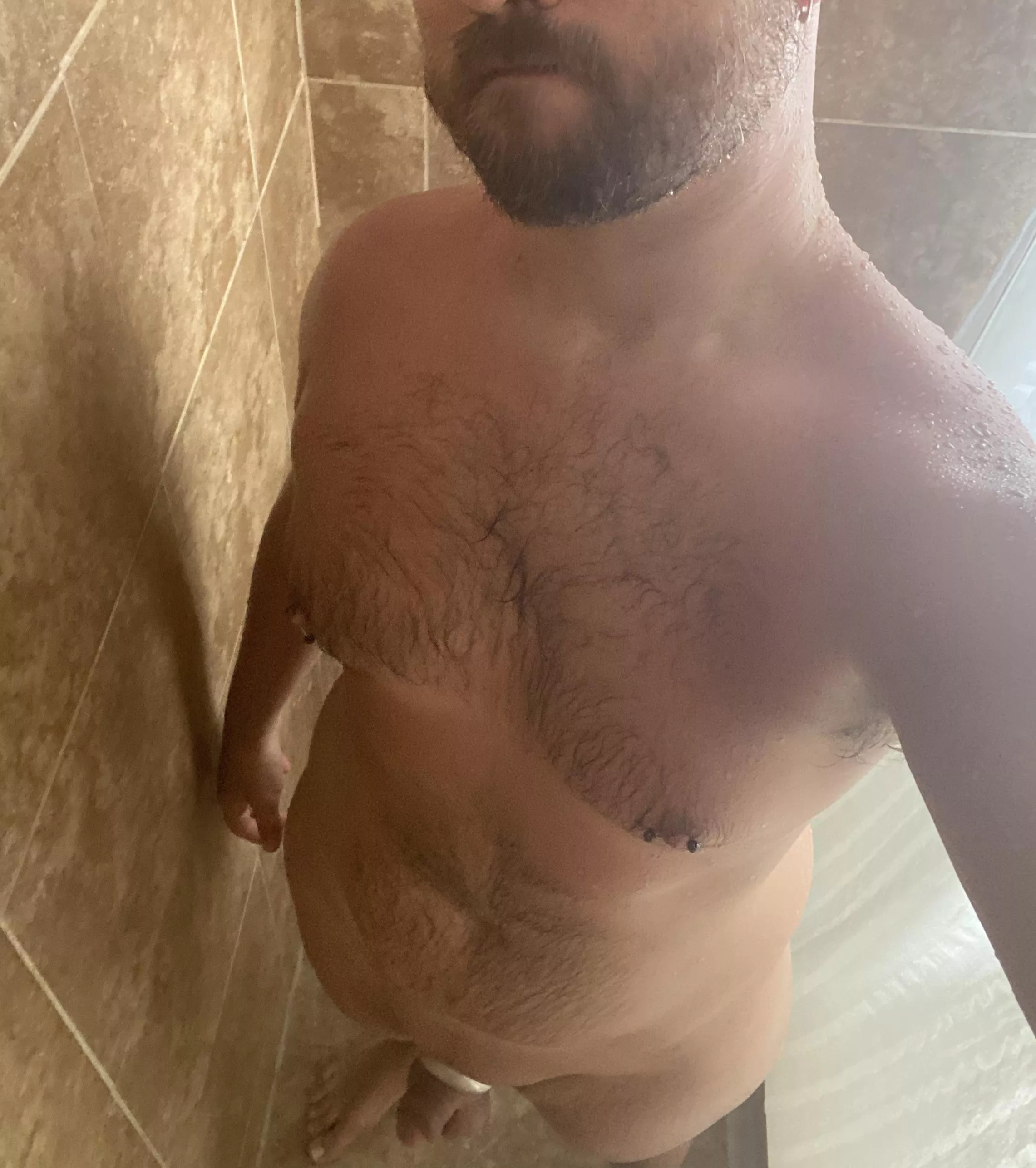 Who wants to join this bear in the shower?