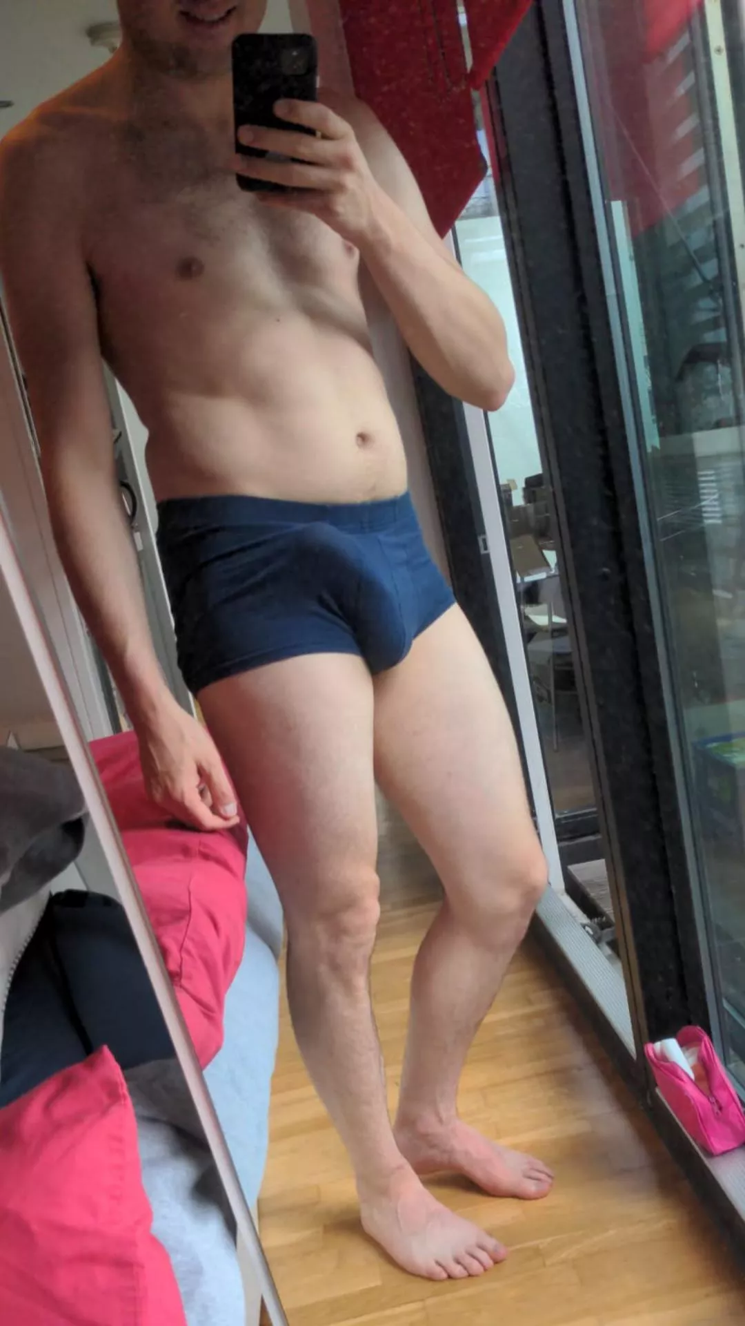 A bulge in blue boxers, soon to be removed…