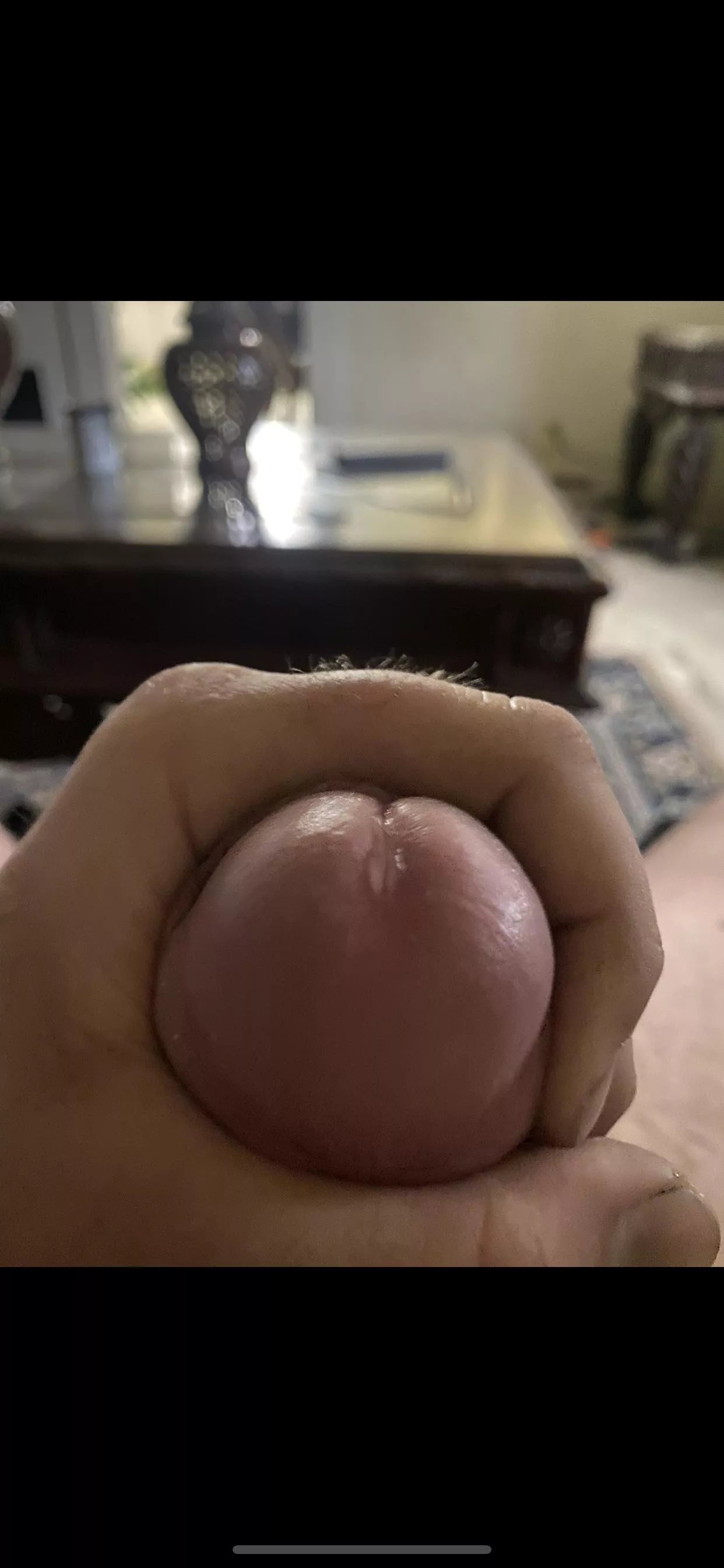 Big shiny head leaking precum