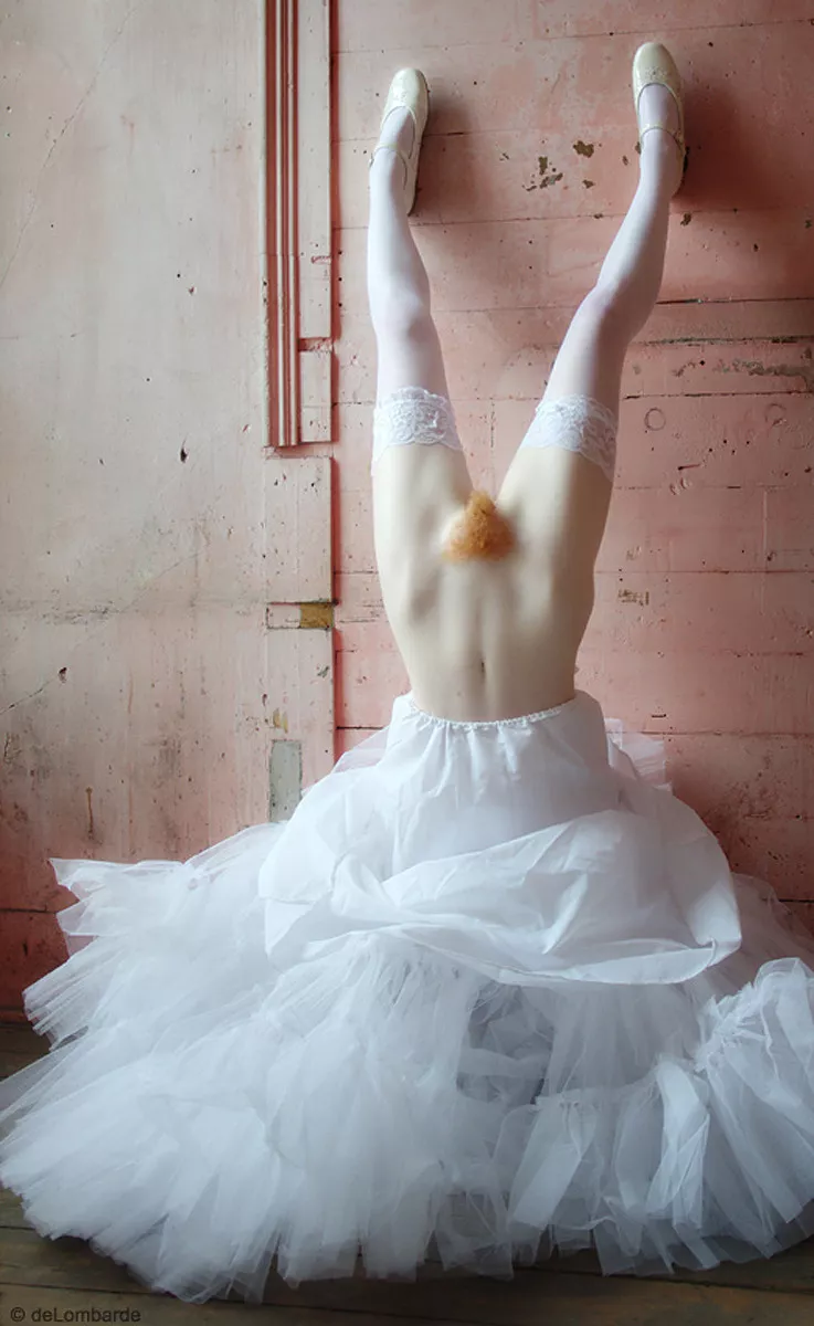 A handstand, which proves she's a redhead...