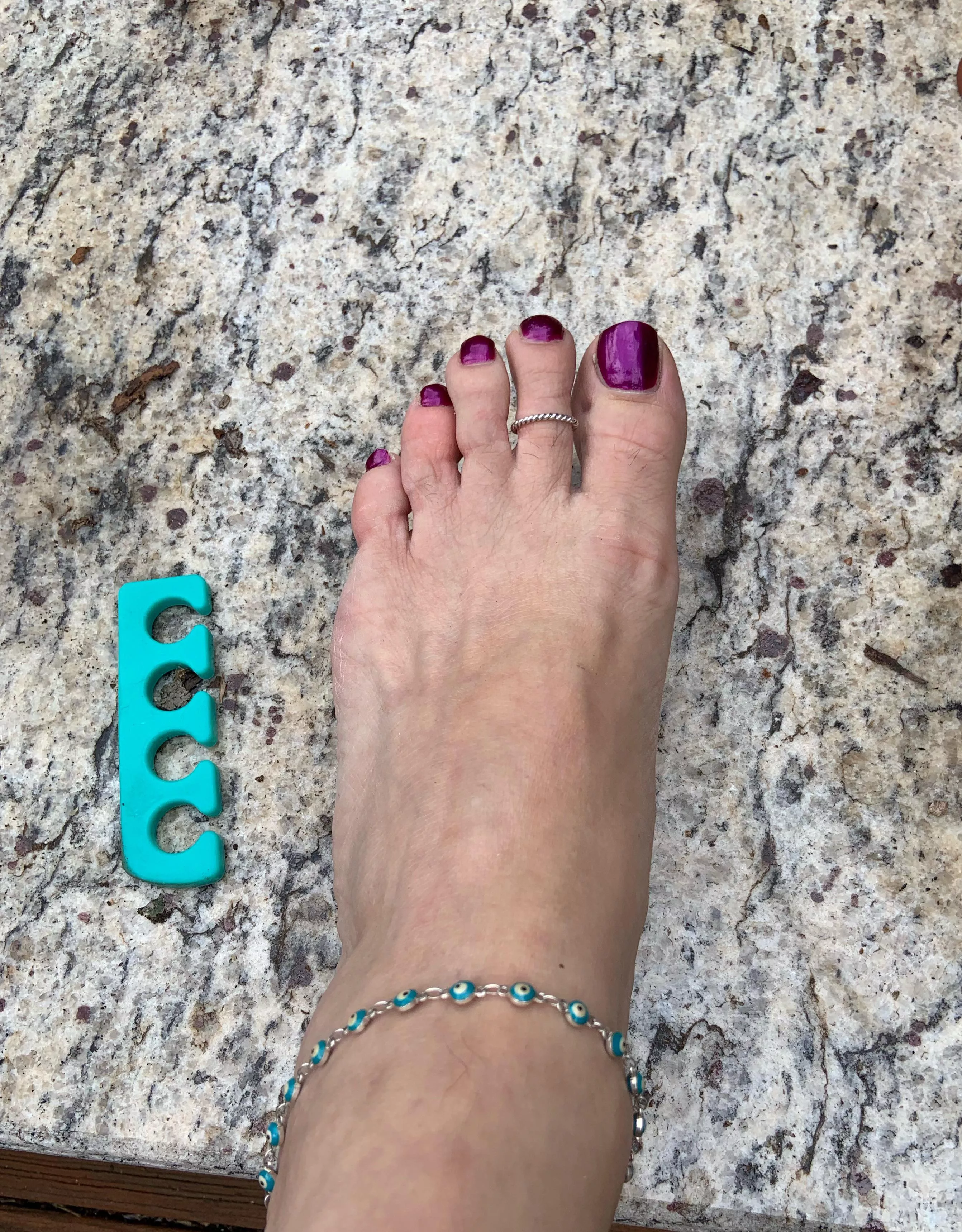 Toes are a bit funny looking right now, but itâ€™s from the spreader. New color now!