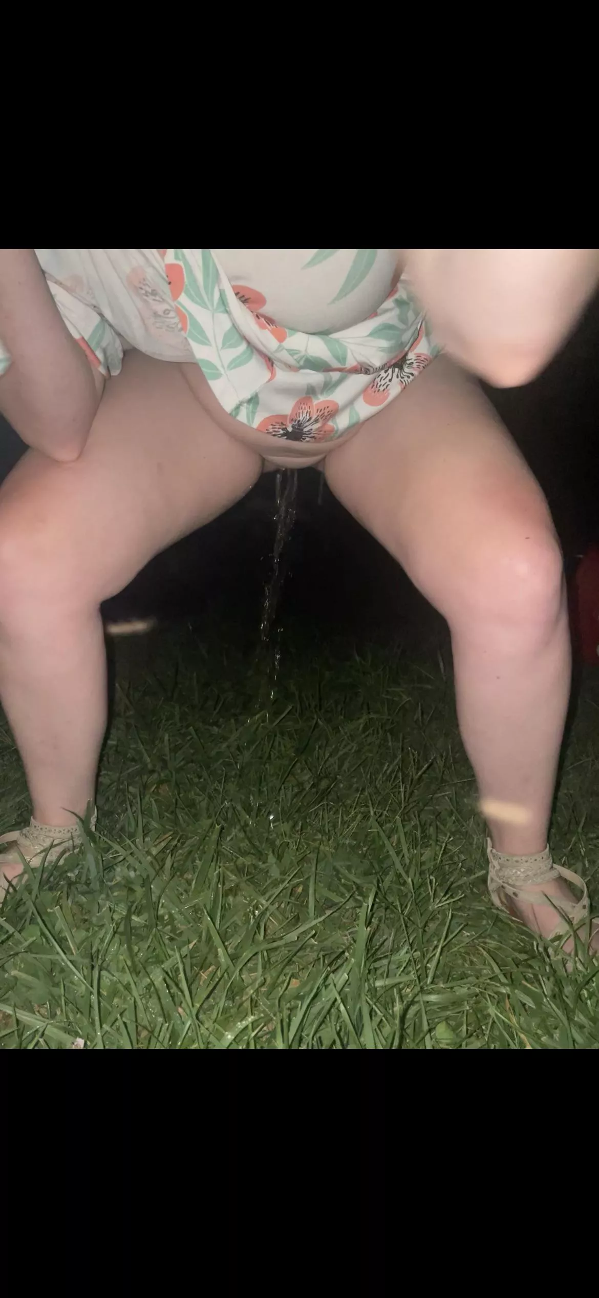 My wife pissing in the yard while drunk