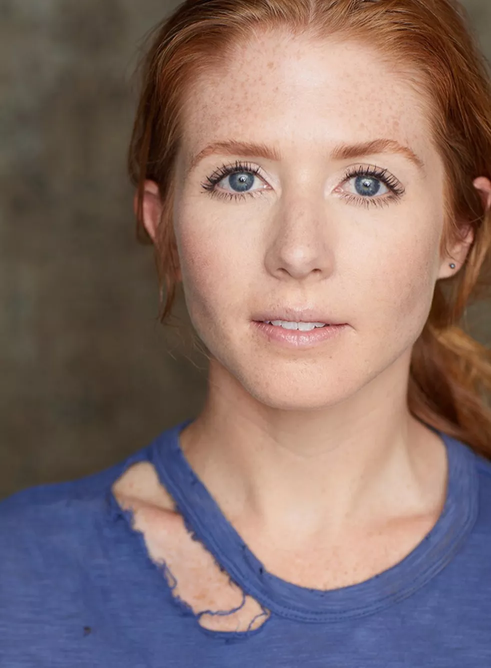 Red hair, blue, eyes, freckles, gorgeous face: perfect.