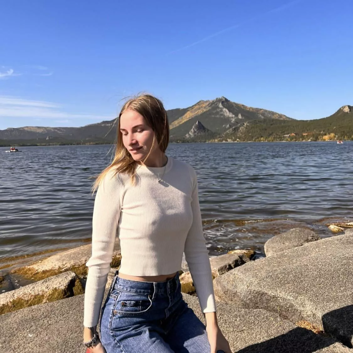 Russian ski jumper Anna Shpyneva poking through her sweater