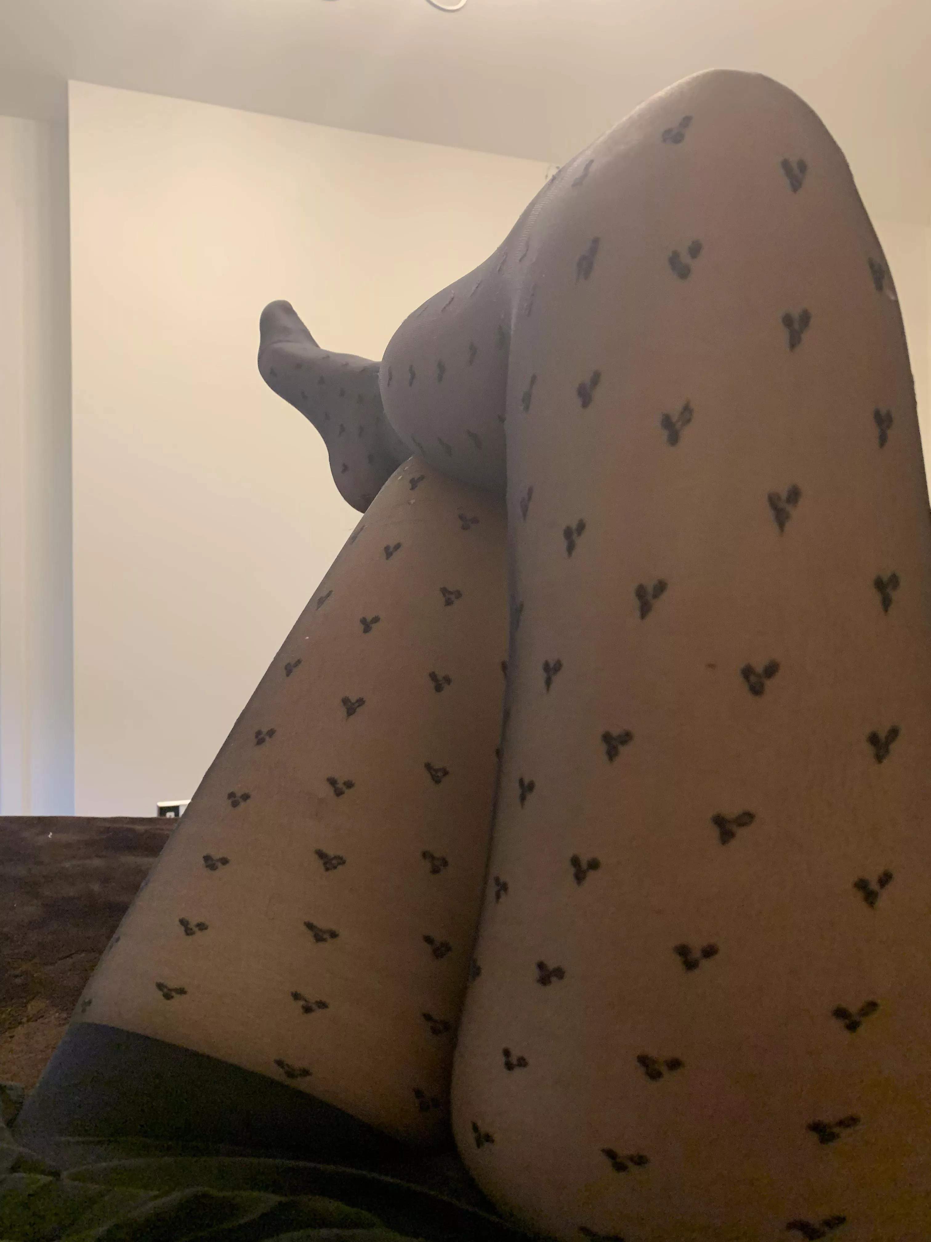 Resting after a long day at work in my heart-patterned pantyhose â¤ï¸