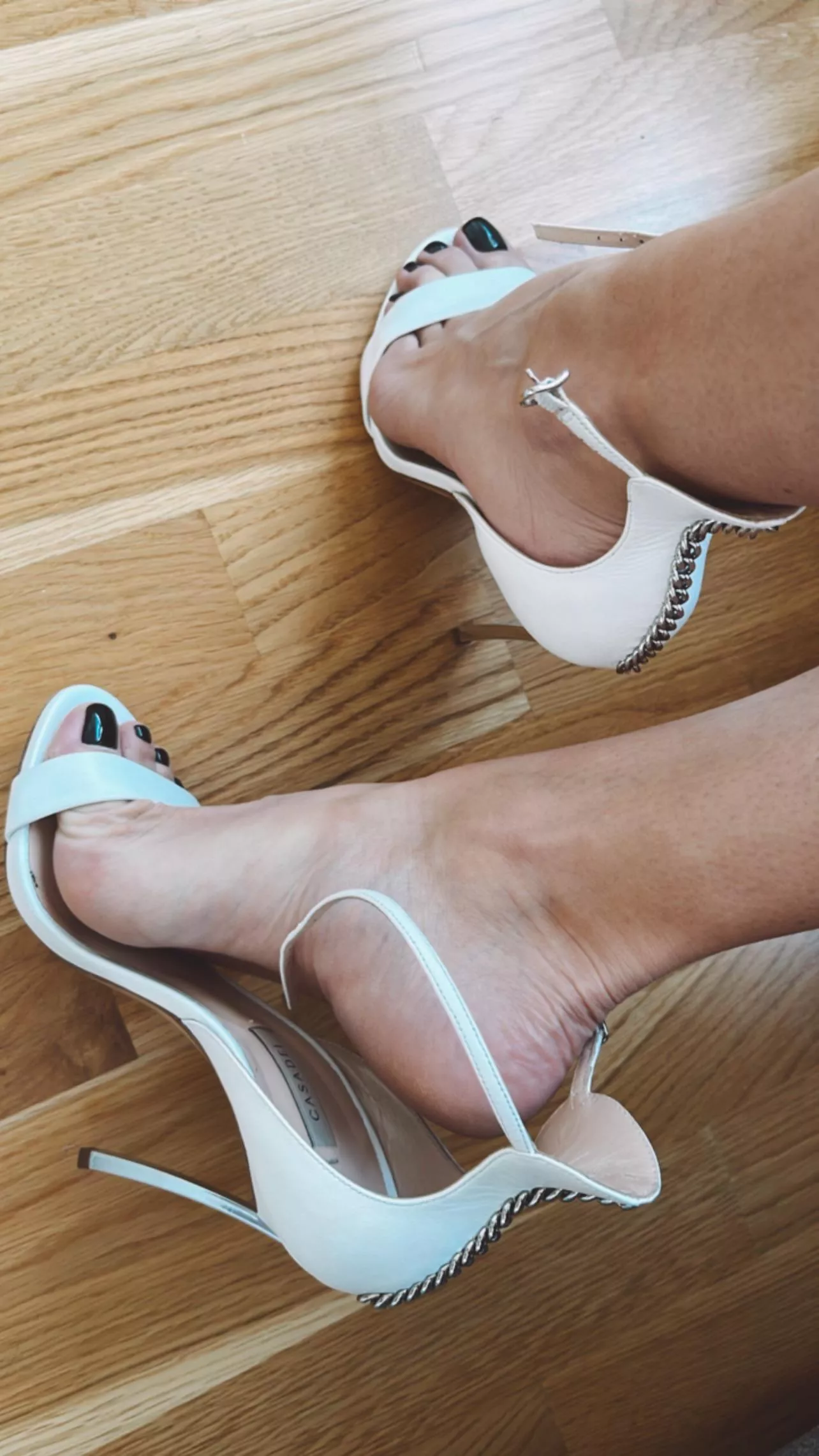 White stiletto sandals. I adore these