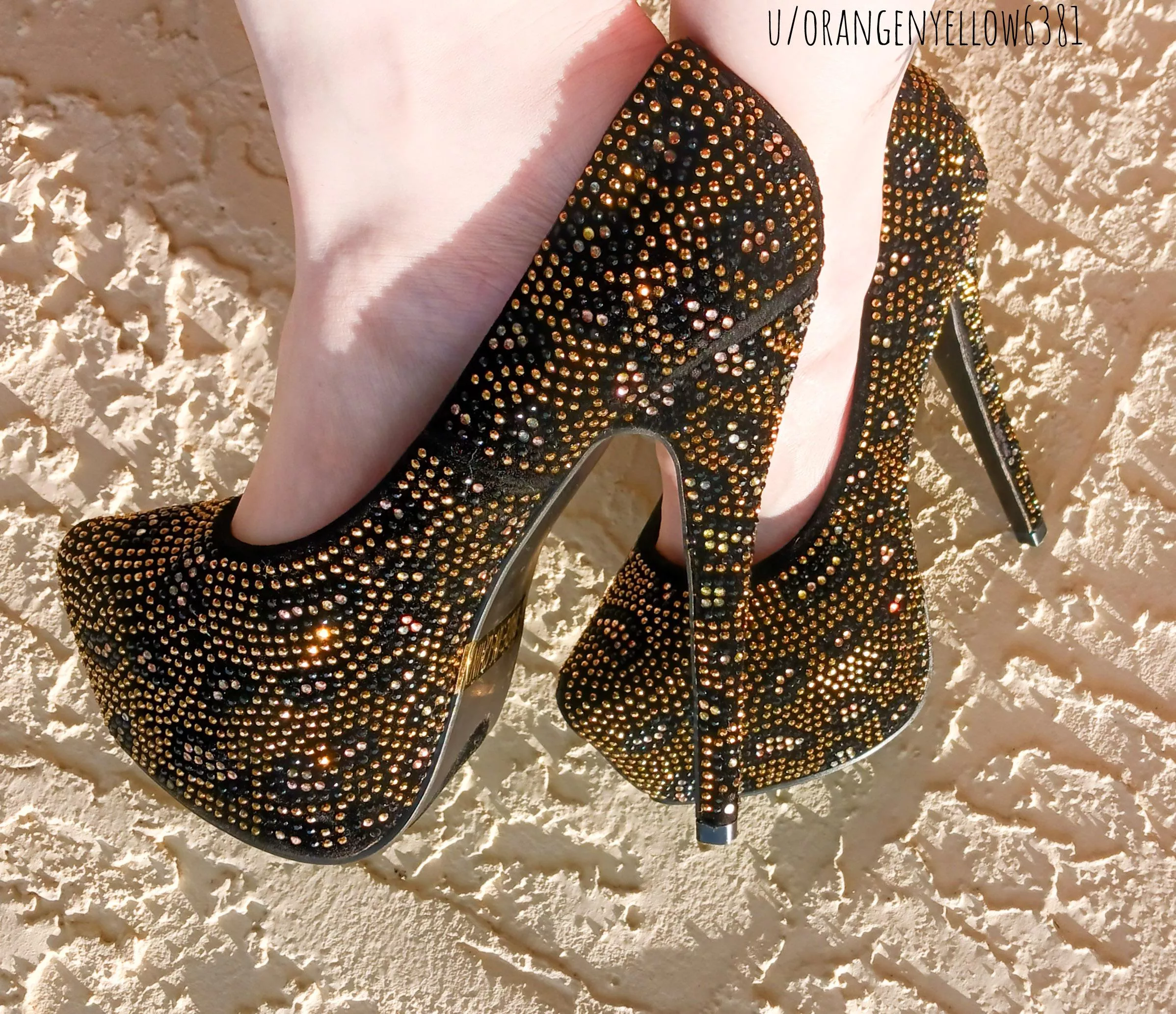 Beautiful stilettos with golden crystals.