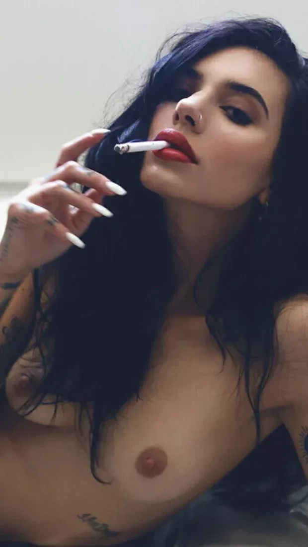 Heavy makeup, prefect tits and cigarette