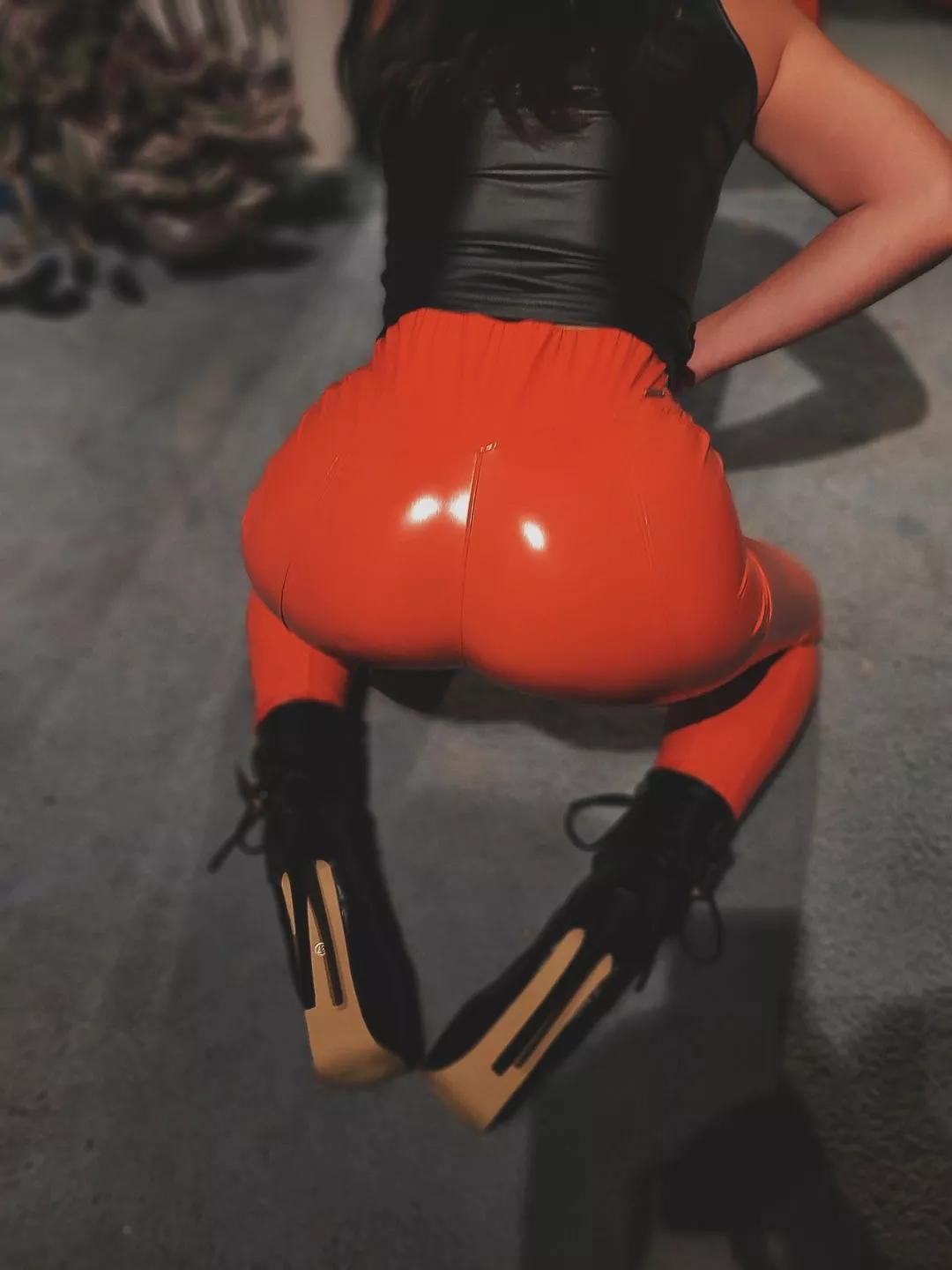 Orange leather leggings