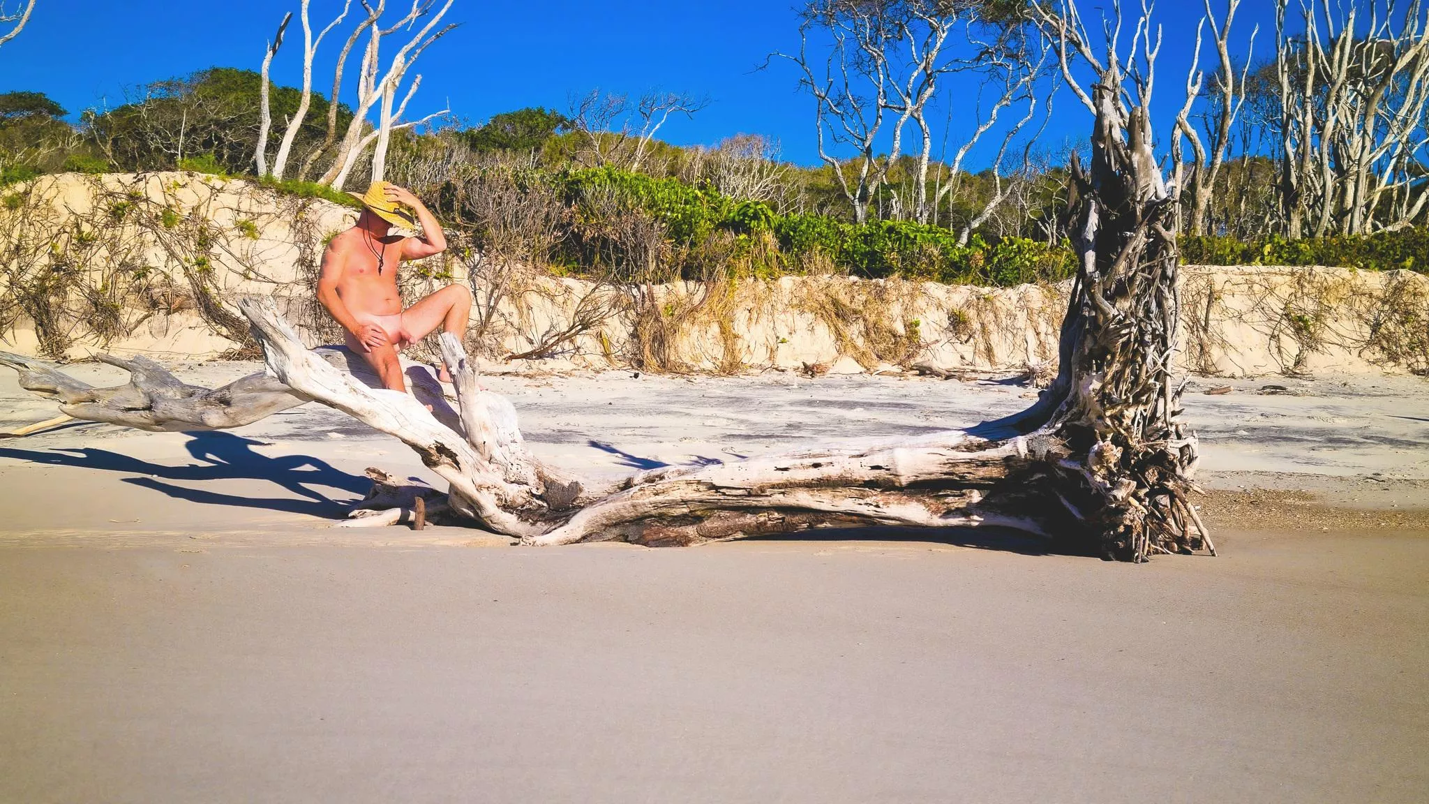 Resting after long naked beach walk