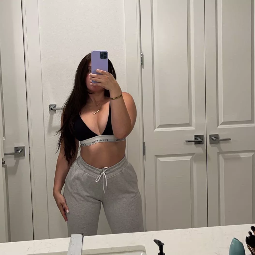 Black Bra and Gray Sweatpants