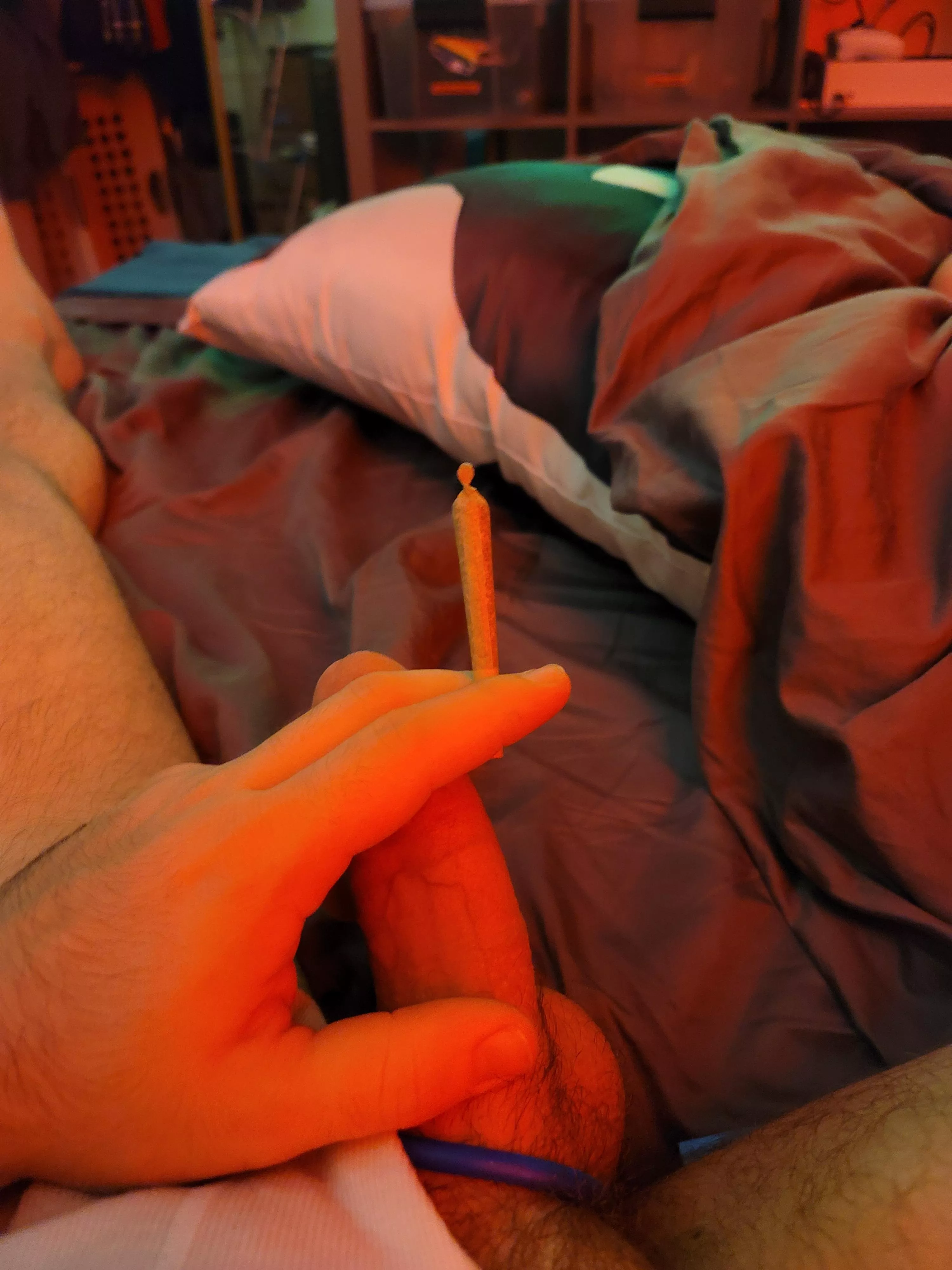 relaxing in bed with a joint.