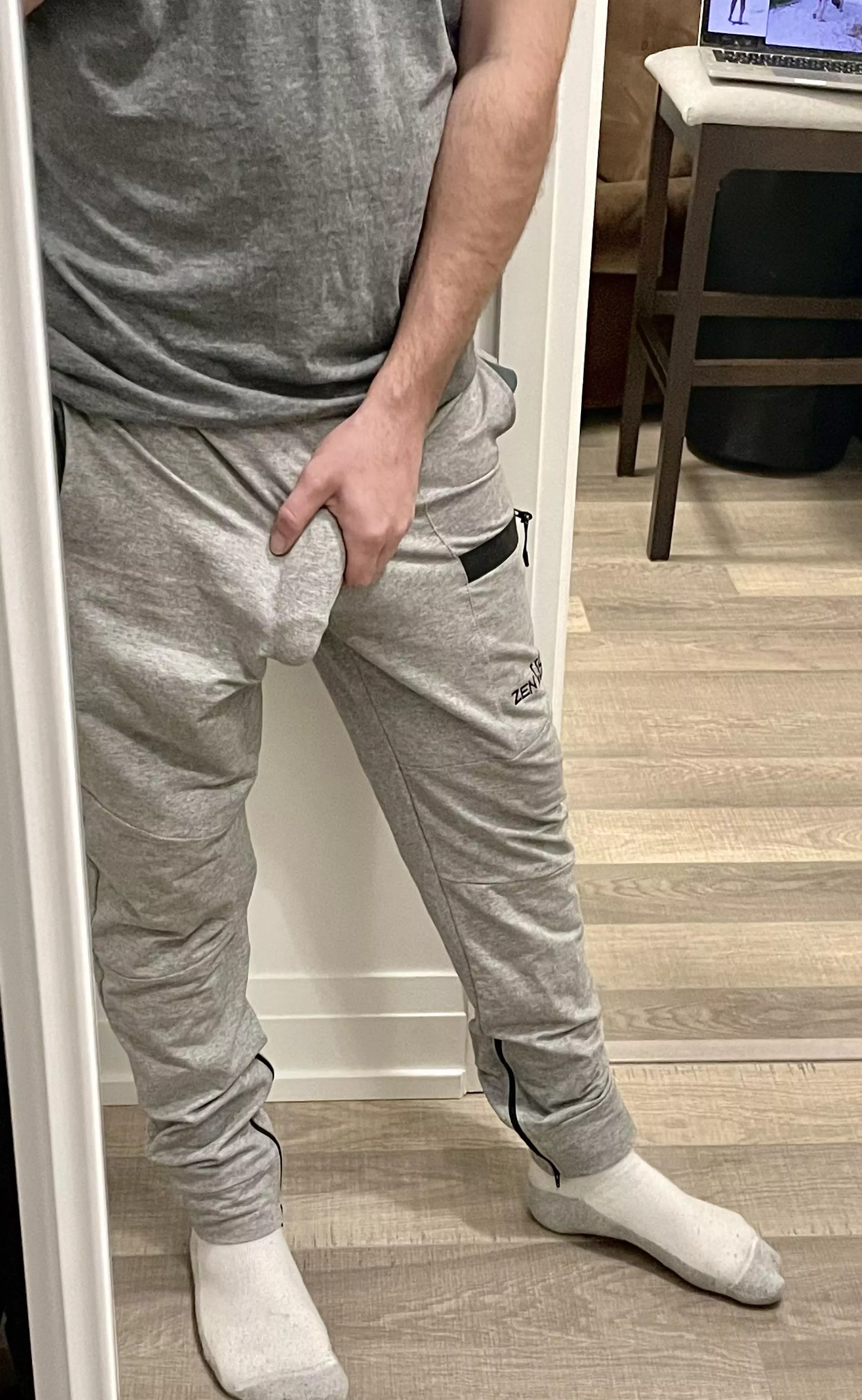 commando in grey sweatpants