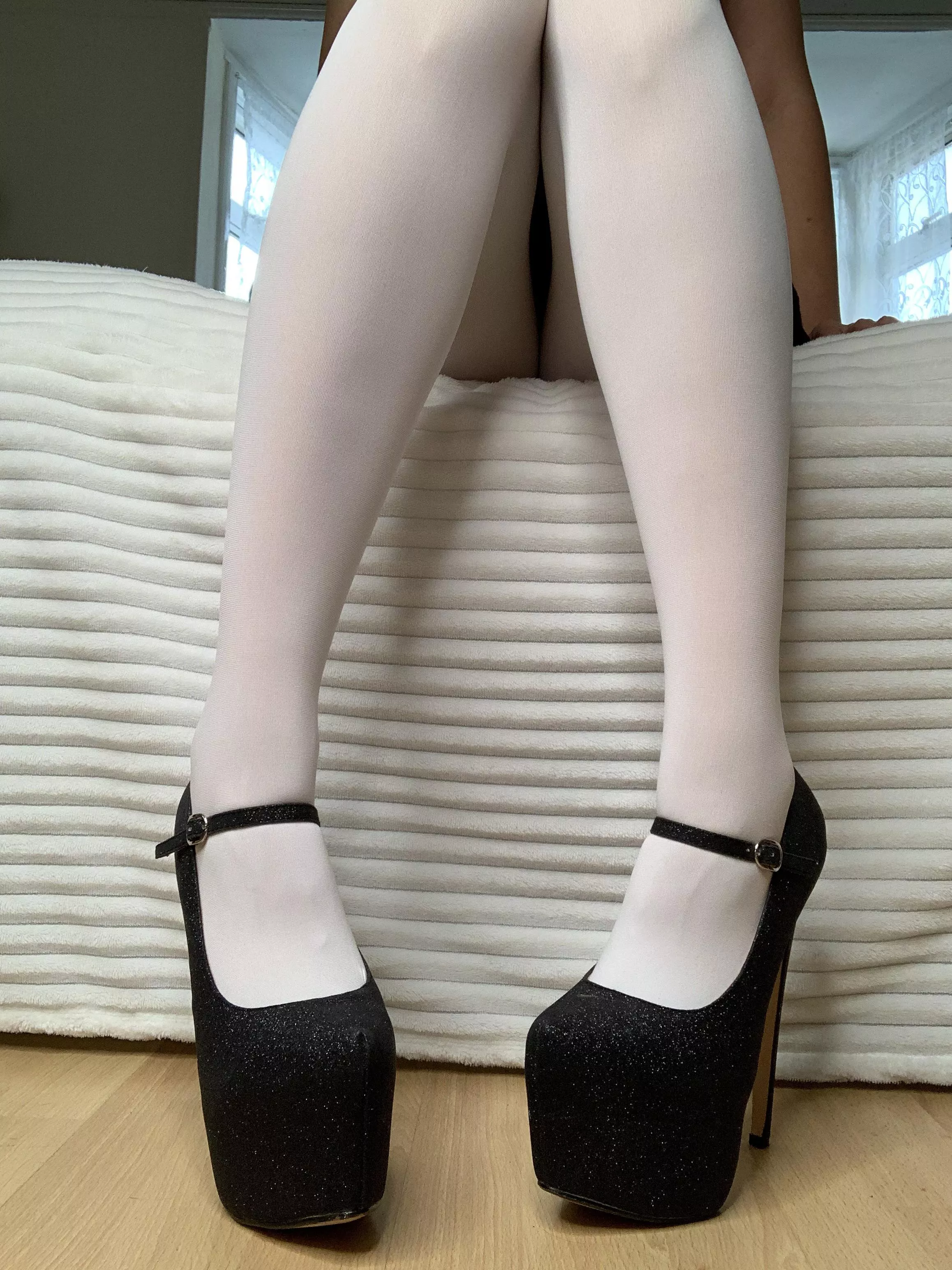 White pantyhose and 7 inch heels. Lovely view