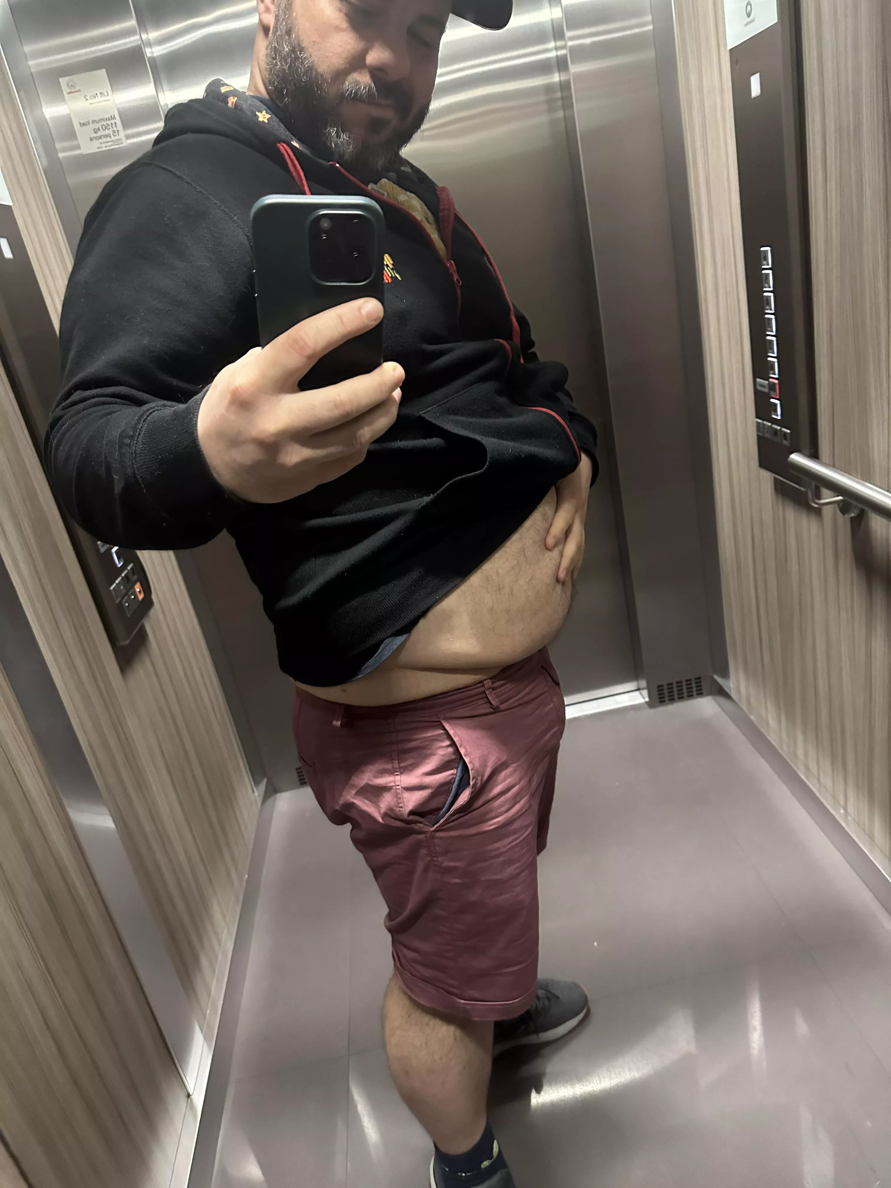 Feeling my belly. Who wants a turn?