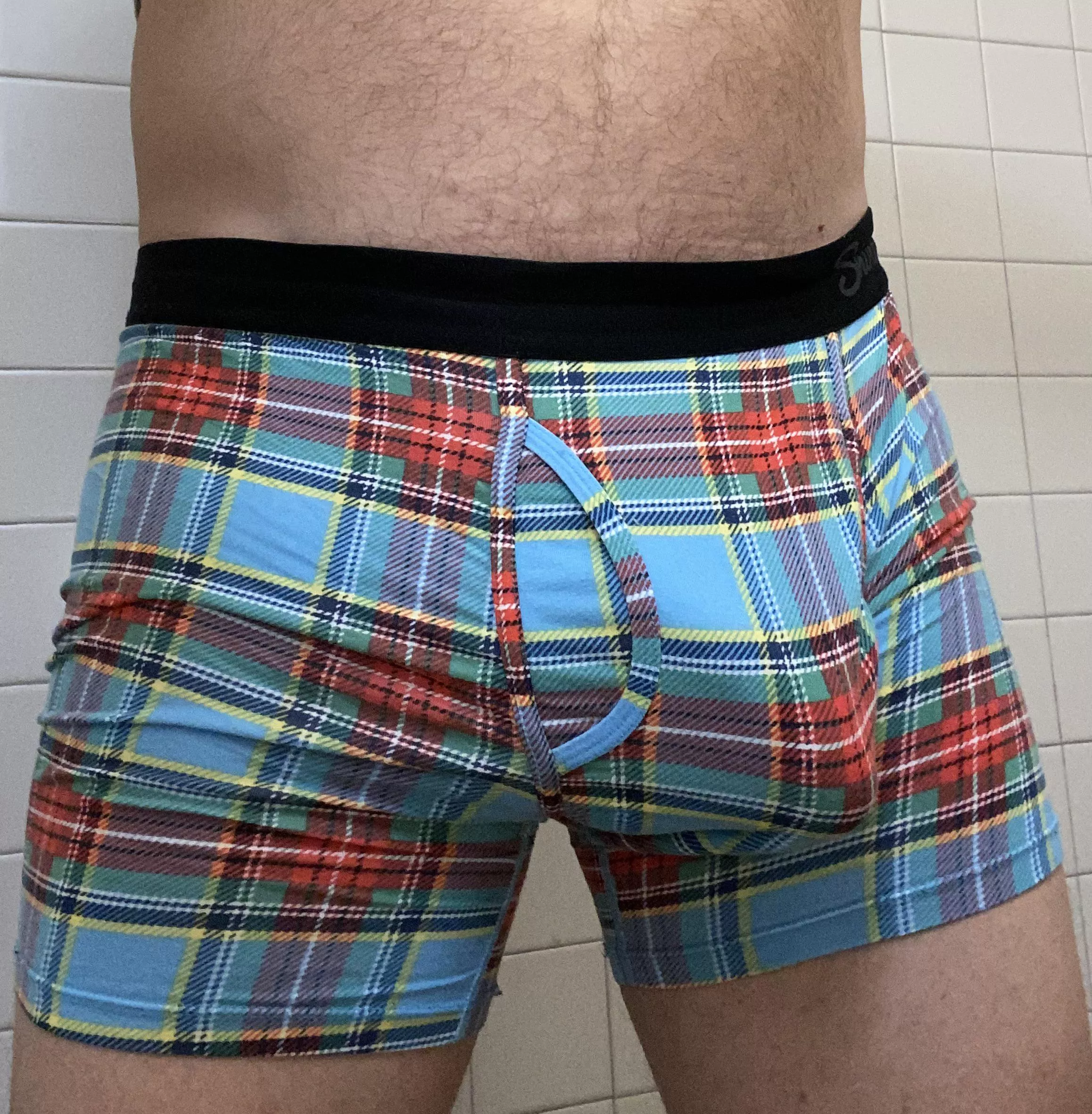 Does the plaid hide the bulge too much?