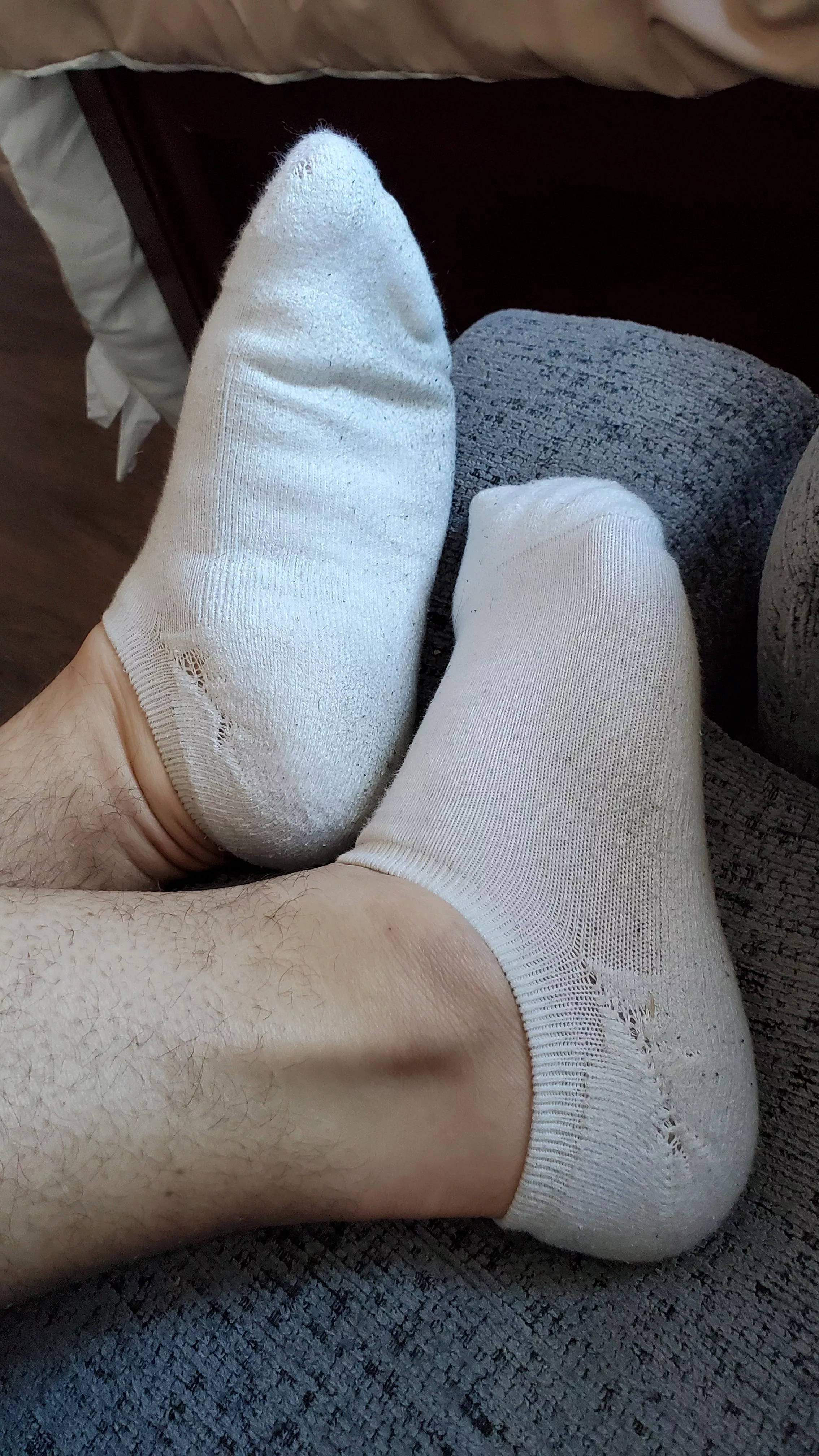 Relaxing in my dirty white socks