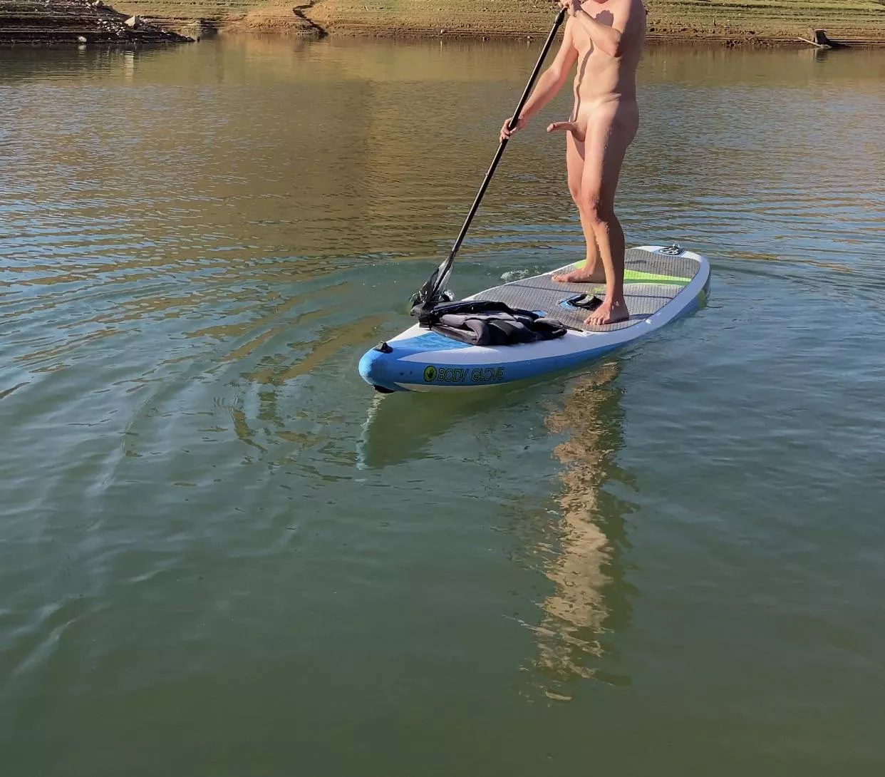 Paddle boarding with a friend, she jokingly dared me to go naked. Needless to say I was up for the challenge!