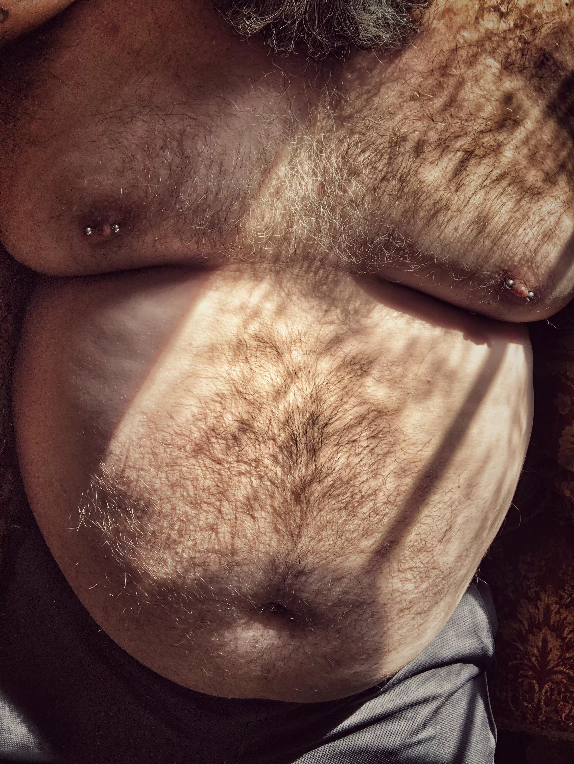 Some sunlight on my hairy chest and belly.