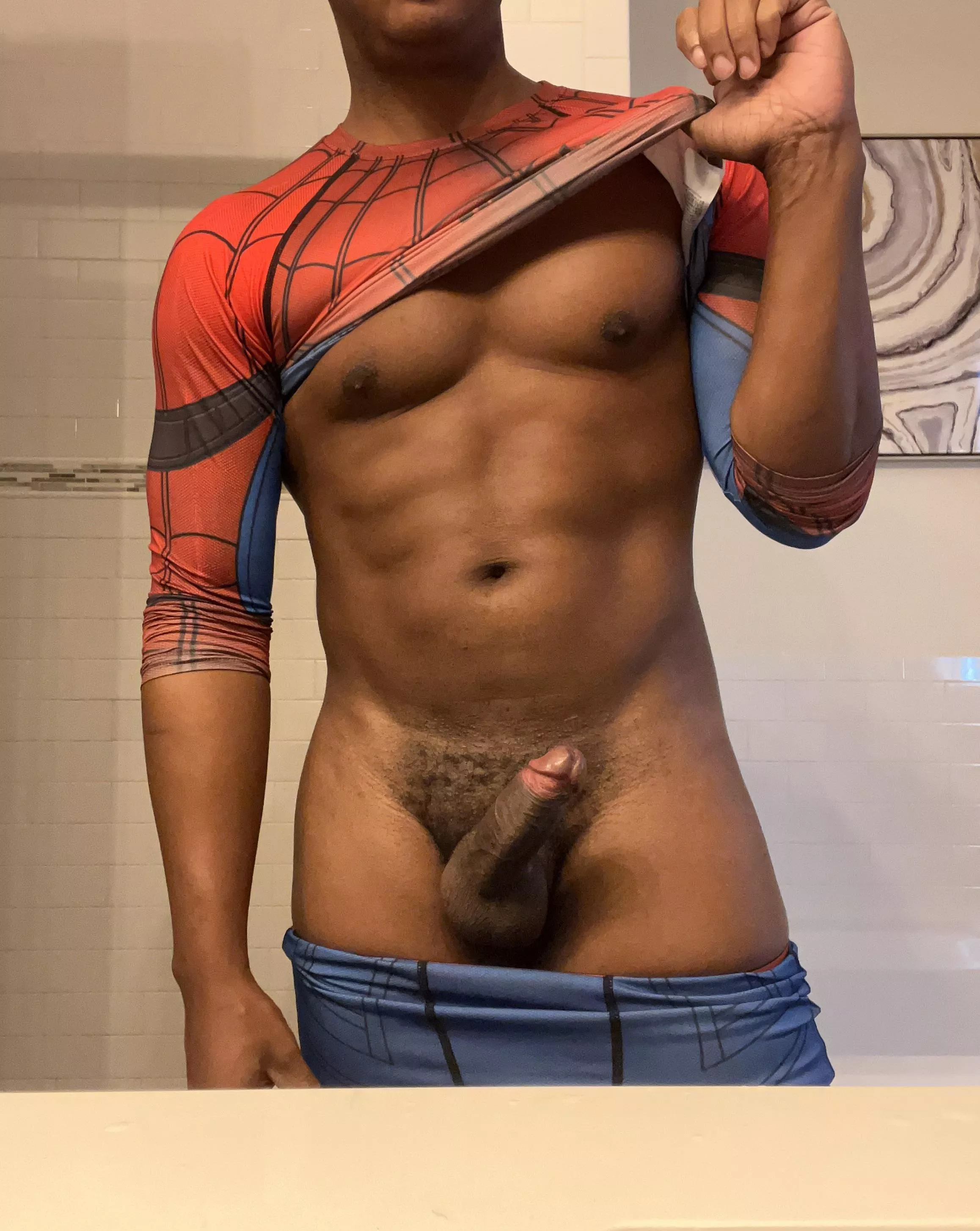 Trying on a Halloween costume. Can I pull off Spider-Man?