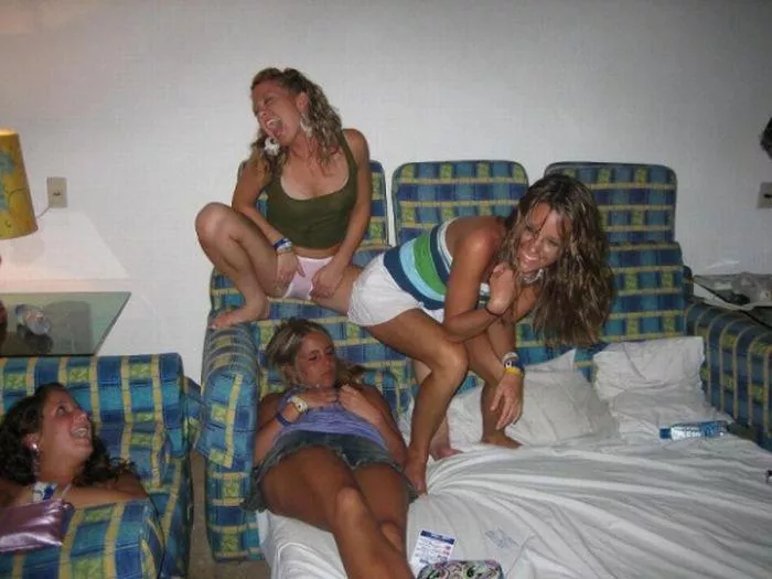 Think she might be farting in her sleeping friends face, at the very least sheâ€™s giving her a good panty flash